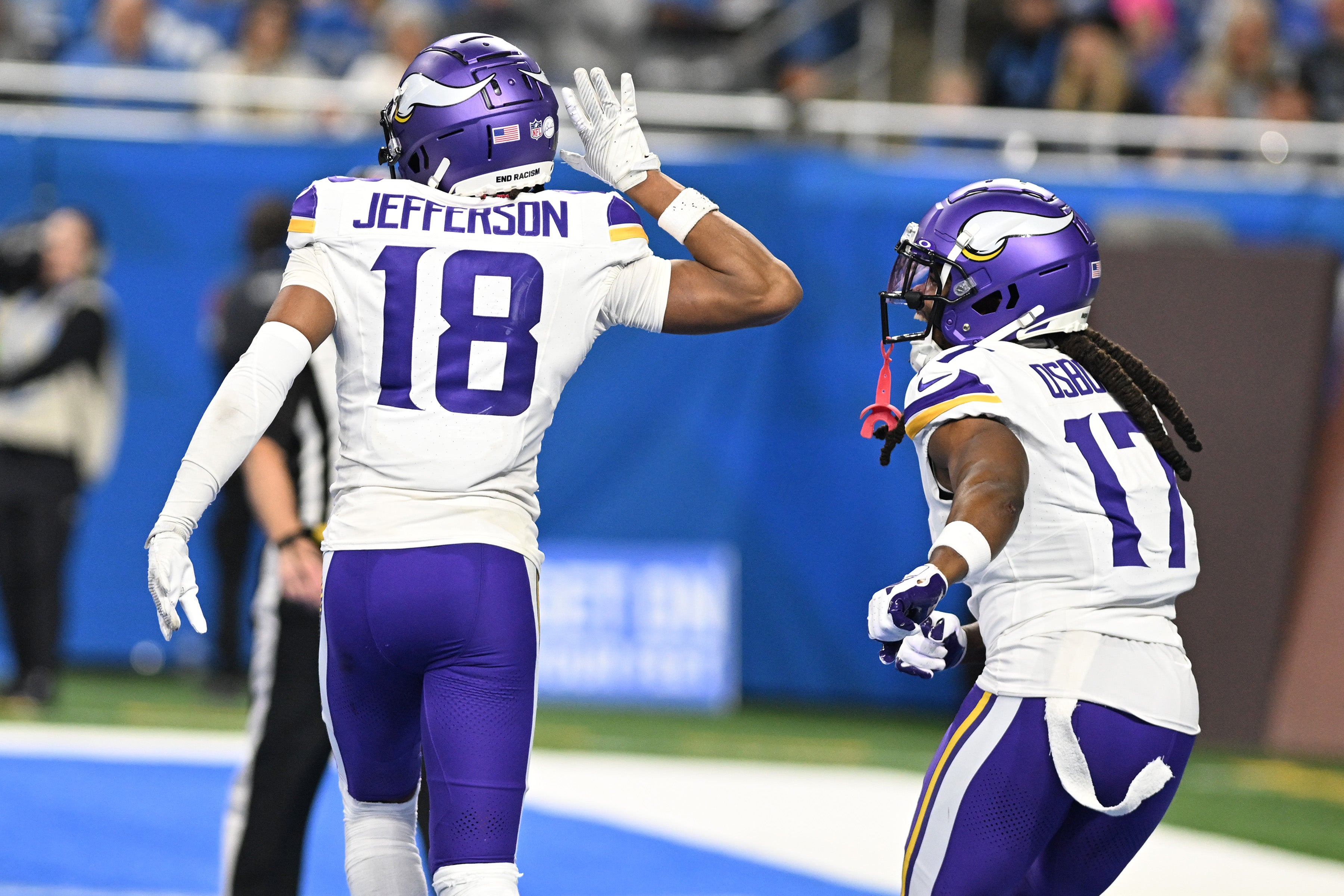 Jan 7, 2024; Detroit, Michigan, USA; Minnesota Vikings wide receiver Justin Jefferson (18) celebrates with wide receiver K.J. Osborn (17) after scoring a touchdown against the Detroit Lions in the third quarter at Ford Field. Mandatory Credit: Lon Horwedel-USA TODAY Sports