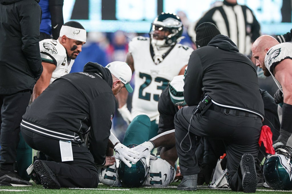 Philadelphia Eagles wide receiver A.J. Brown (11) reacts after an injury against the New York Giants during the first quarter at MetLife Stadium.