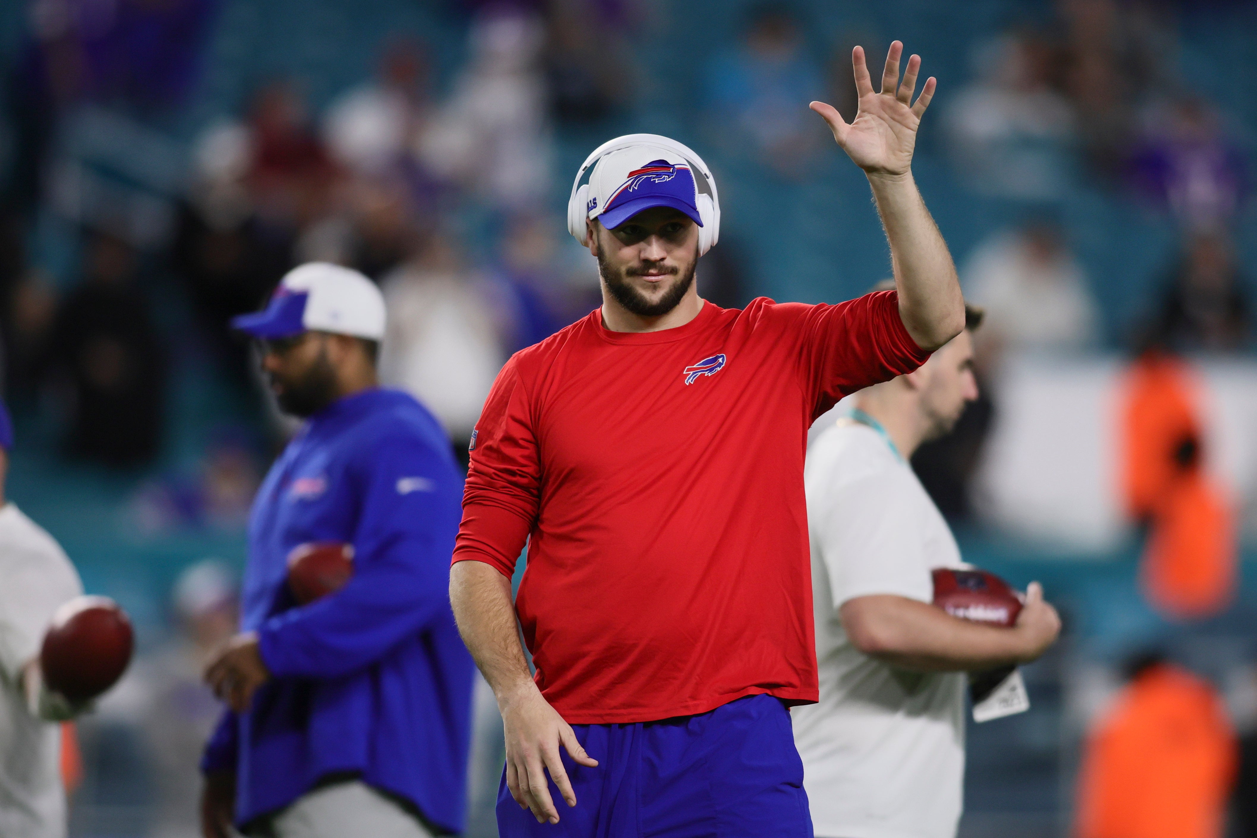 Buffalo Bills quarterback Josh Allen waves from the field prior to the game against the Miami Dolphins at Hard Rock Stadium.