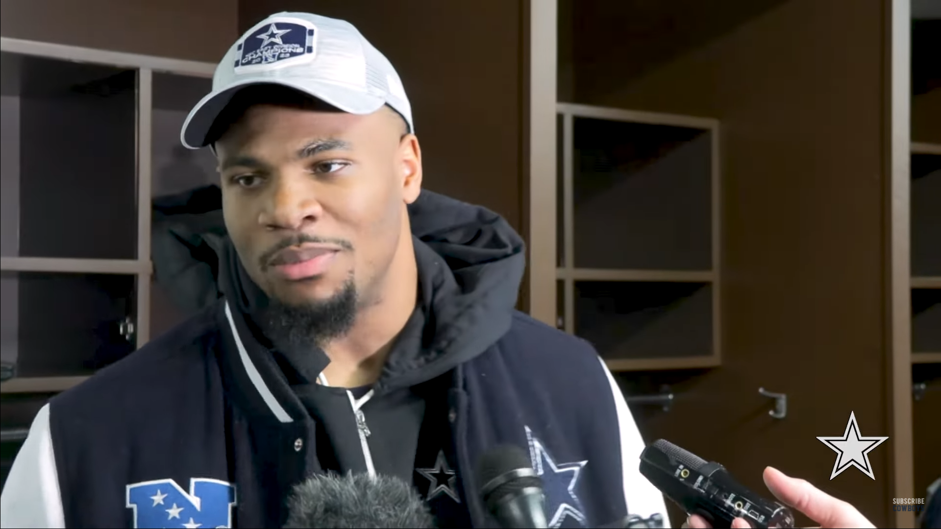 Dallas Cowboys' edge rusher Micah Parsons talks to reporters postgame following a Week 18 win over the Washington Commanders.