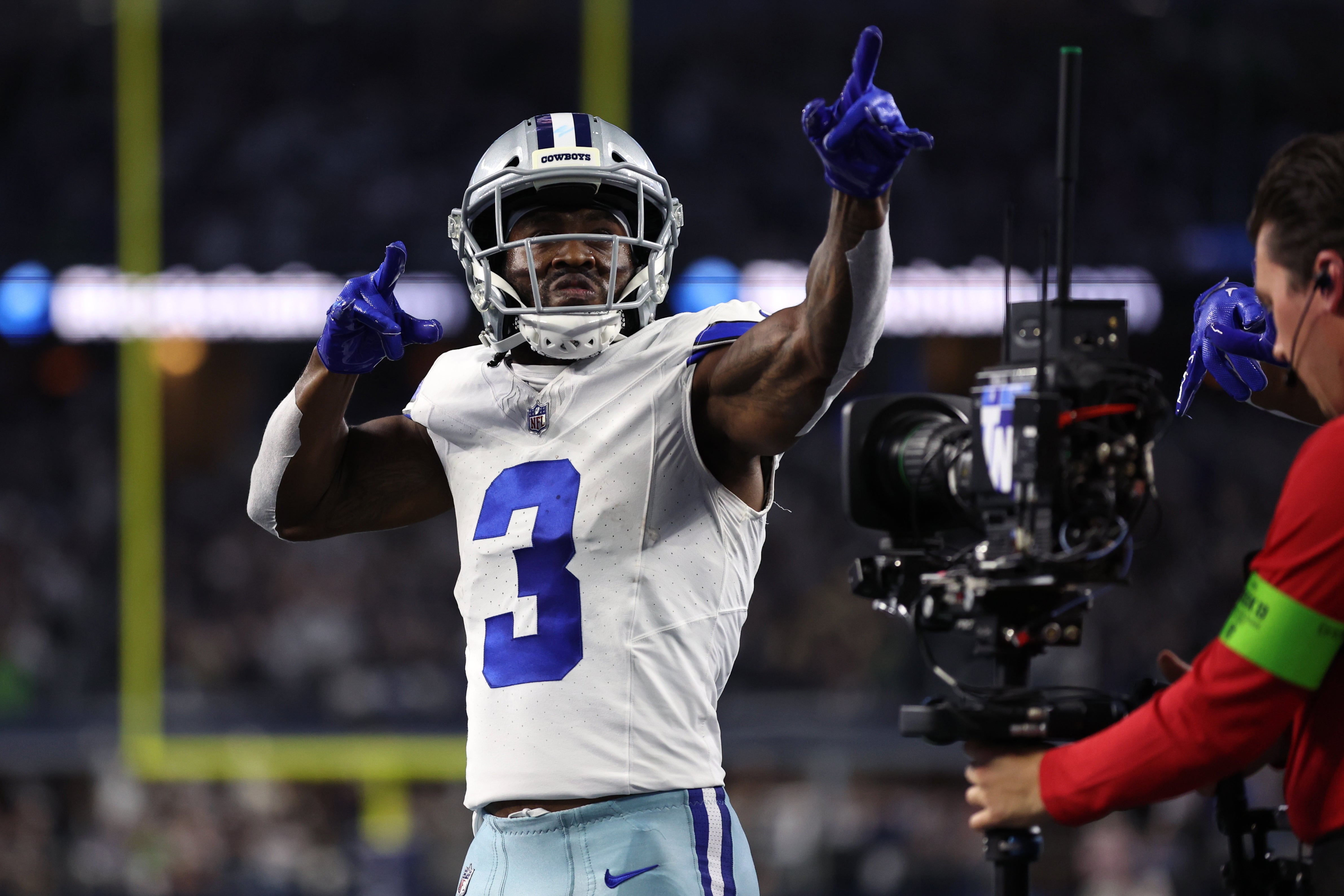 Dallas Cowboys wide receiver Brandin Cooks (3) celebrates after scoring a touchdown against the Seattle Seahawks during the first half at AT&T Stadium.