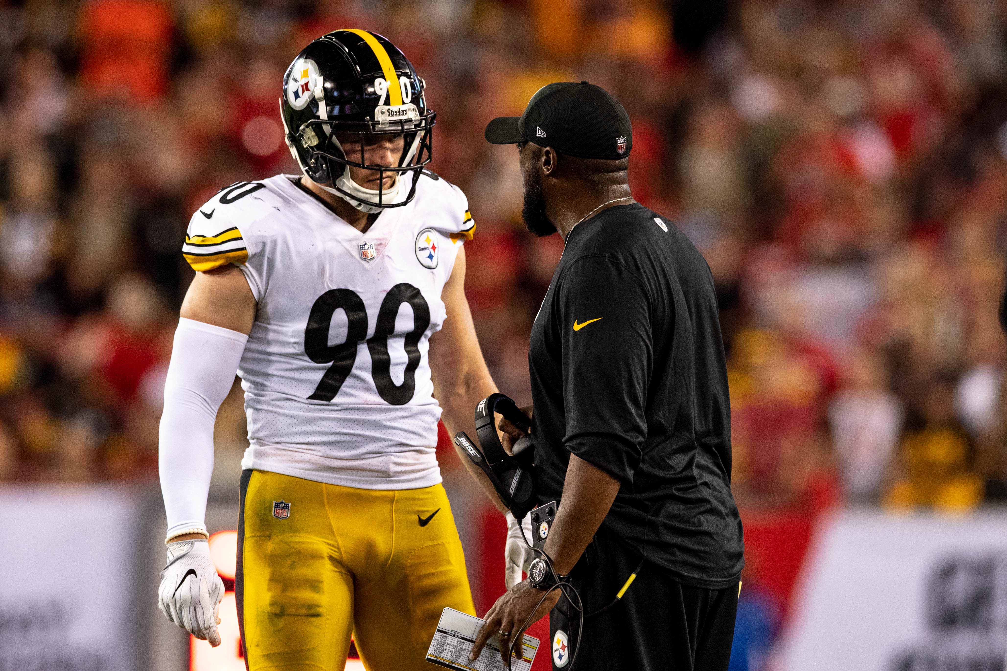 Sep 24, 2018; Tampa, FL, USA; Pittsburgh Steelers linebacker T.J. Watt (90) talks with Pittsburgh Steelers head coach Mike Tomlin during the first half against the Tampa Bay Buccaneers at Raymond James Stadium. Mandatory Credit: Douglas DeFelice-USA TODAY Sports