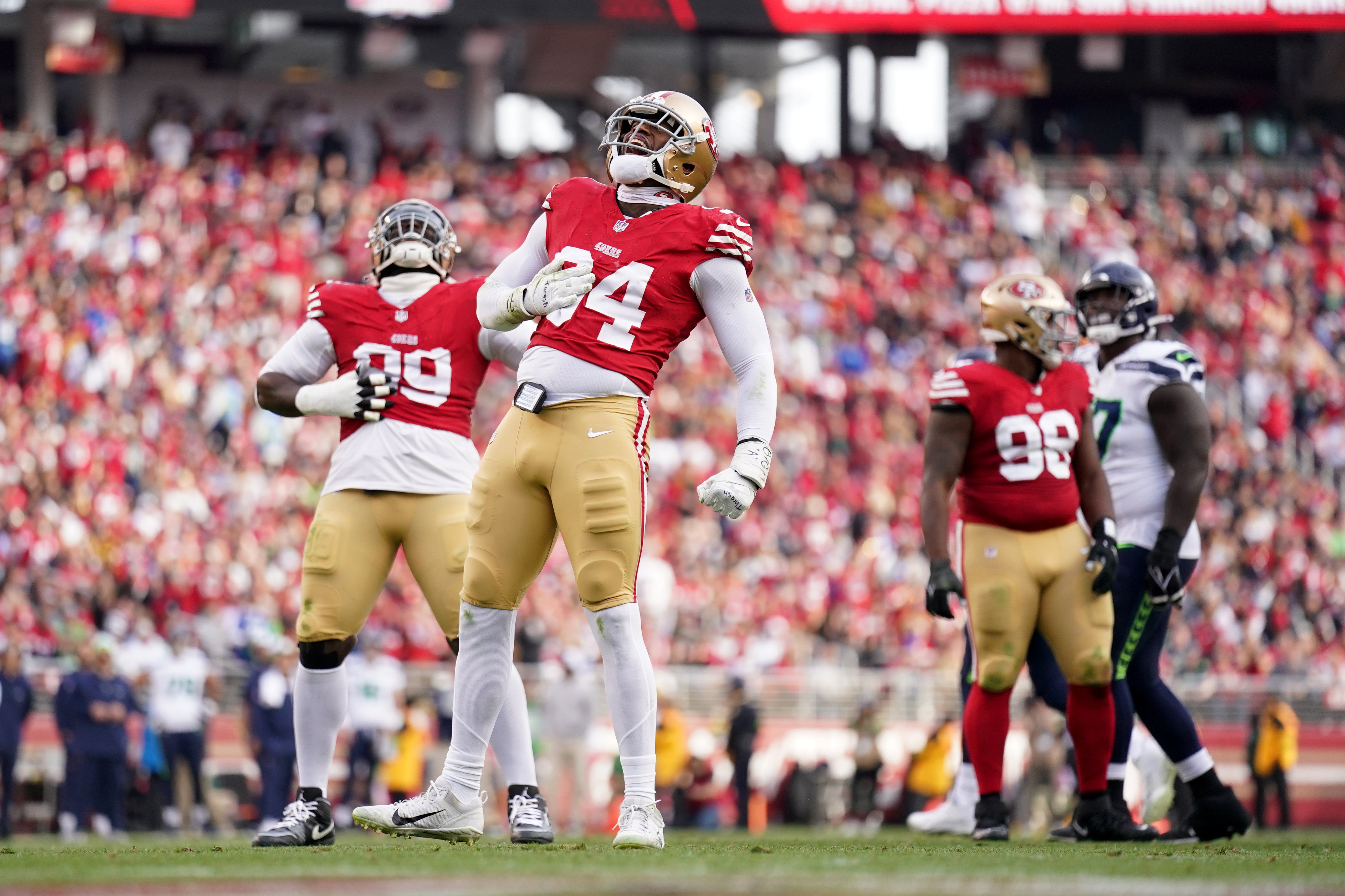 Dec 10, 2023; Santa Clara, California, USA; San Francisco 49ers defensive end Clelin Ferrell (94) reacts after making a tackle against the Seattle Seahawks in the third quarter at Levi's Stadium.