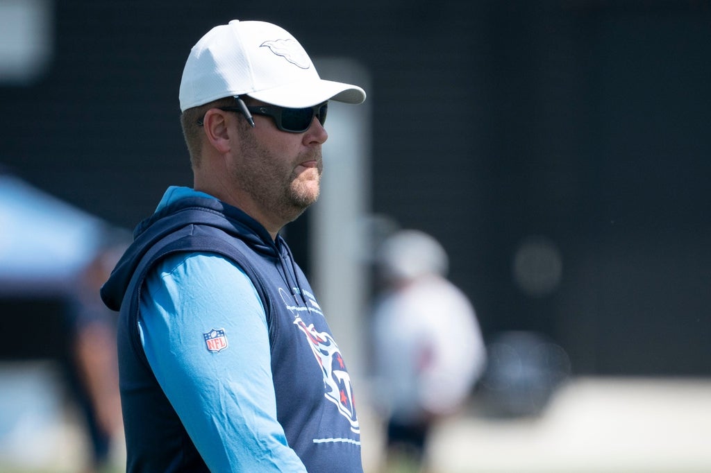 Tennessee Titans general manager Jon Robinson walks across the field during practice at Ascension Saint Thomas Sports Park Thursday, Sept. 15, 2022, in Nashville, Tenn.