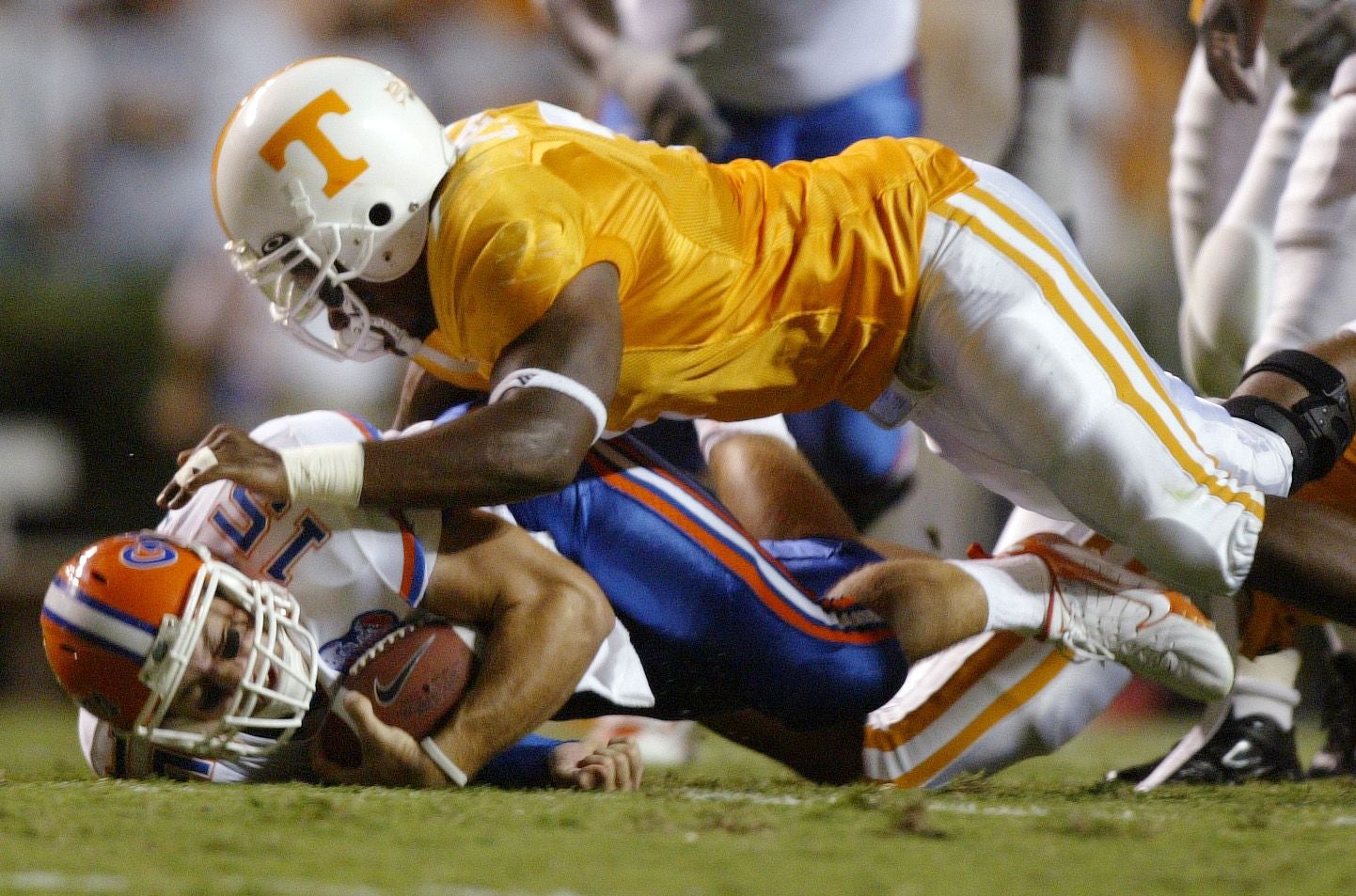 Tennessee's Jerod Mayo takes down Florida quarterback Tim Tebow on Saturday at Neyland Stadium