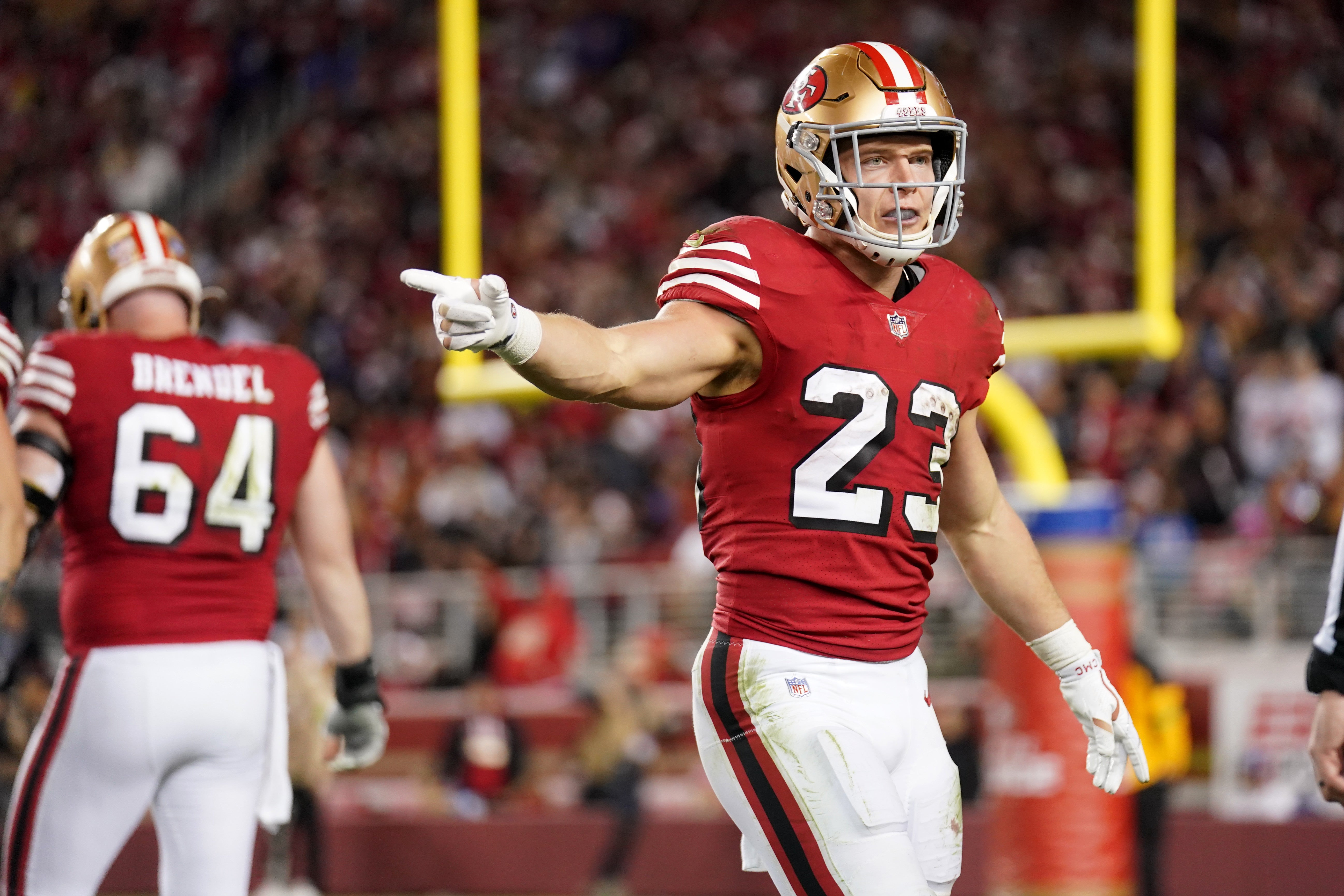 Dec 25, 2023; Santa Clara, California, USA; San Francisco 49ers running back Christian McCaffrey (23) reacts after a play against the Baltimore Ravens in the third quarter at Levi's Stadium.