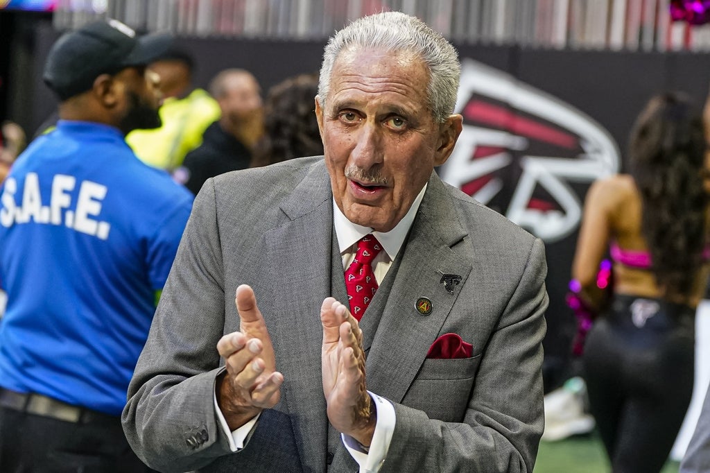 Atlanta Falcons team owner Arthur Blank reacts after the Falcons defeated the Houston Texans with a field goal on the last play of the second half at Mercedes-Benz Stadium.