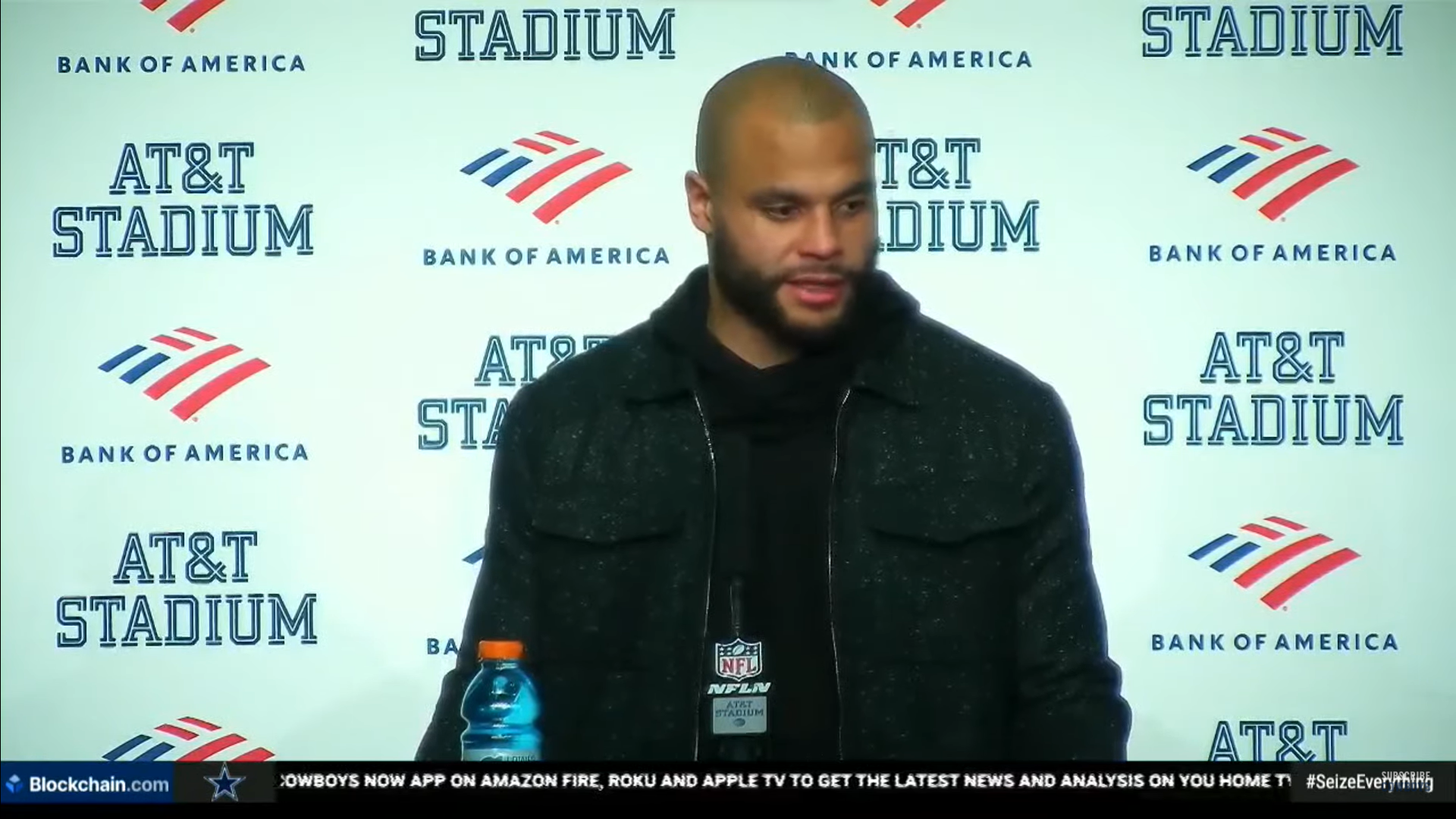 Dallas Cowboys quarterback Dak Prescott talks to reporters postgame after loss to Green Bay Packers.