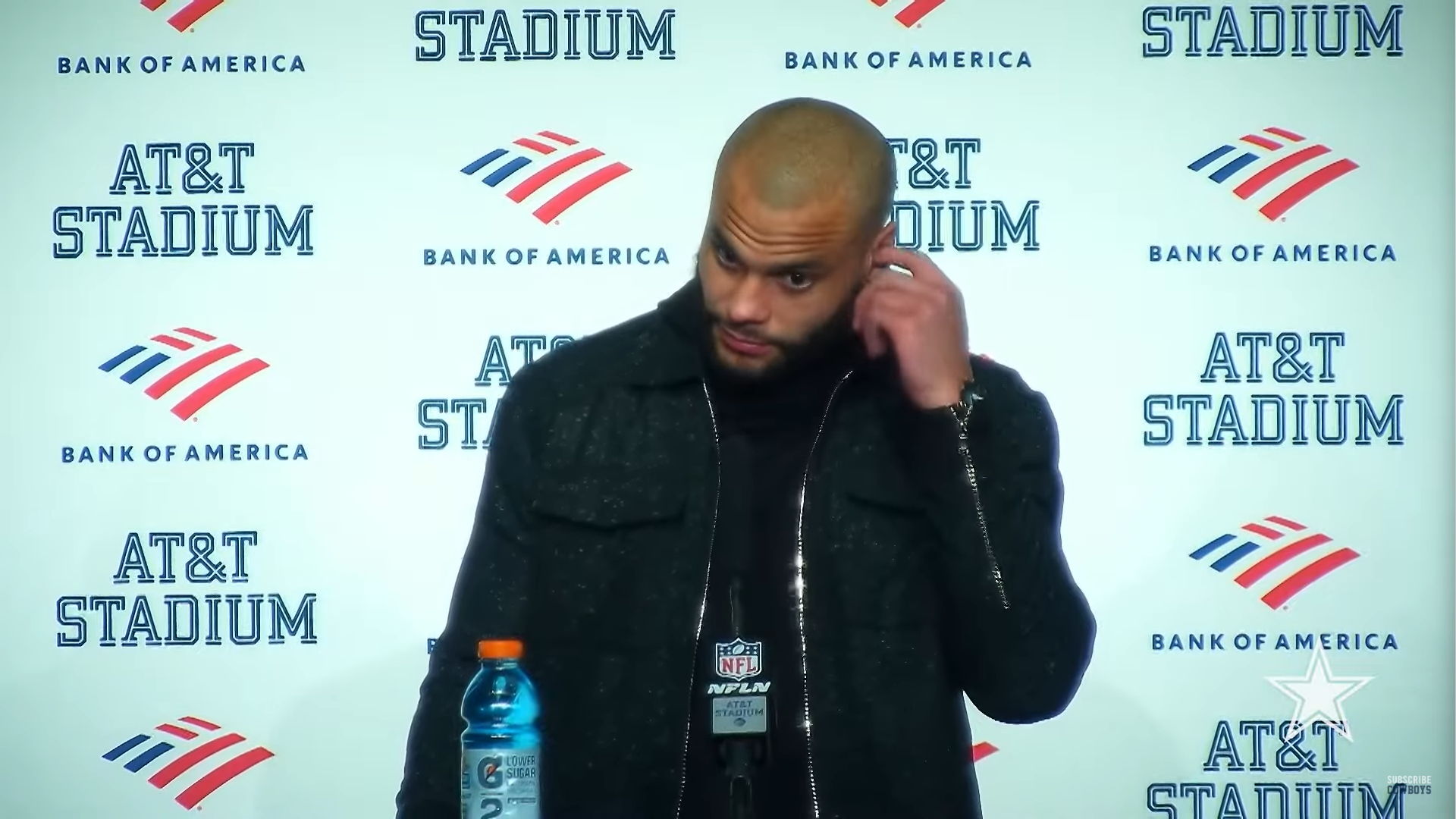 Dallas Cowboys quarterback Dak Prescott talks to reporters postgame after loss to Green Bay Packers.