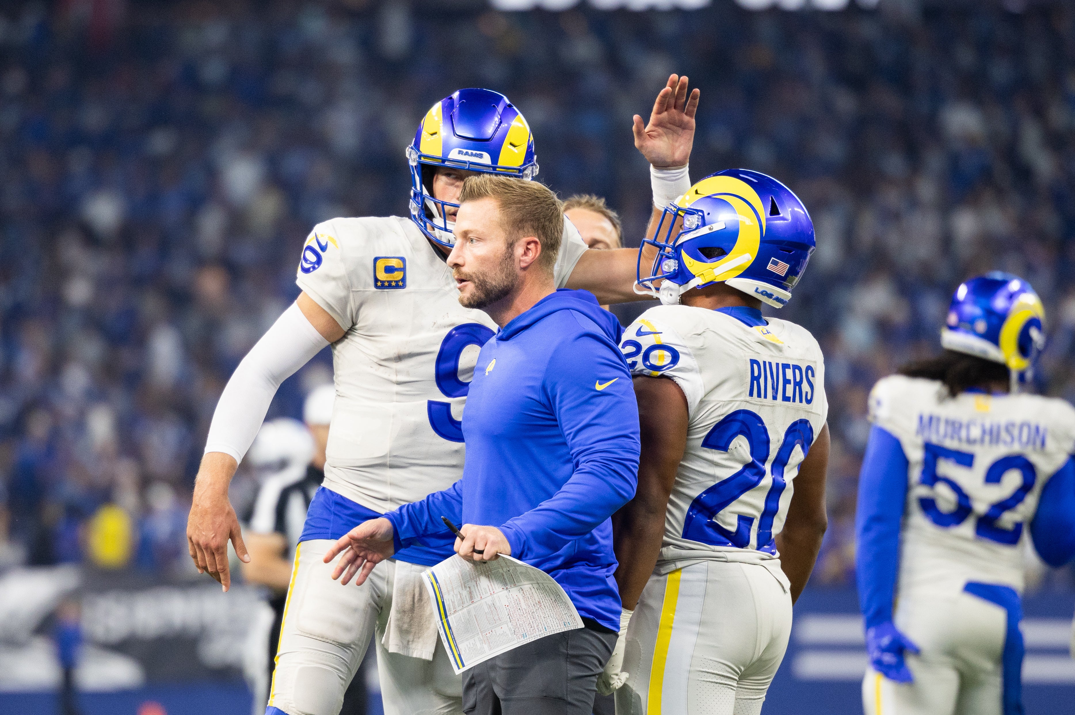 Oct 1, 2023; Indianapolis, Indiana, USA; Los Angeles Rams quarterback Matthew Stafford (9) celebrates his game winning pass with teammates and head coach Sean McVay in the overtime against the Indianapolis Colts at Lucas Oil Stadium. Mandatory Credit: Trevor Ruszkowski-USA TODAY Sports