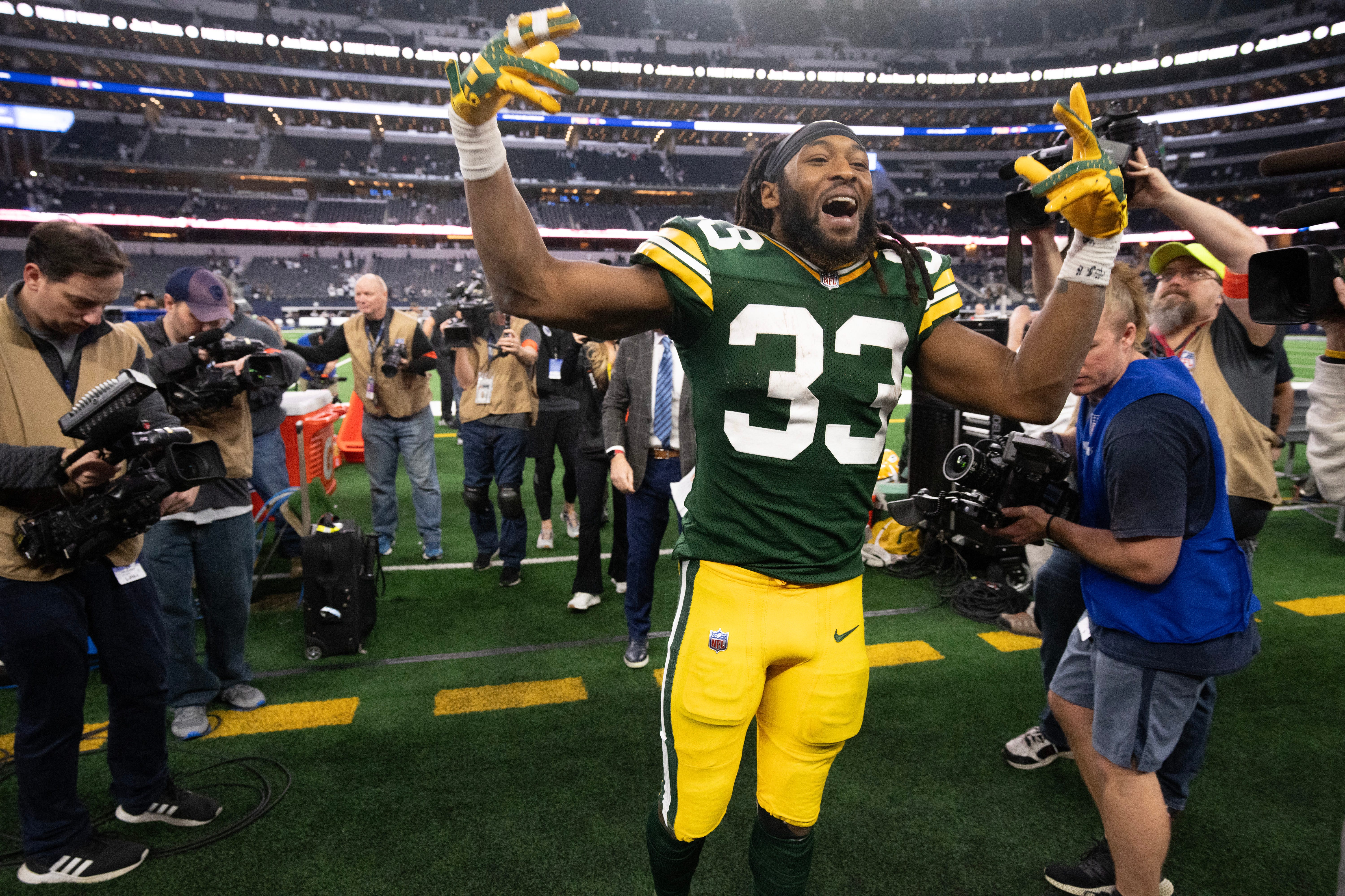 Green Bay Packers running back Aaron Jones (33) leaves the field after their wild card playoff game Sunday, January 14, 2024 at AT&T Stadium in Arlington, Texas. The Green Bay Packers beat the Dallas Cowboys 48-32.