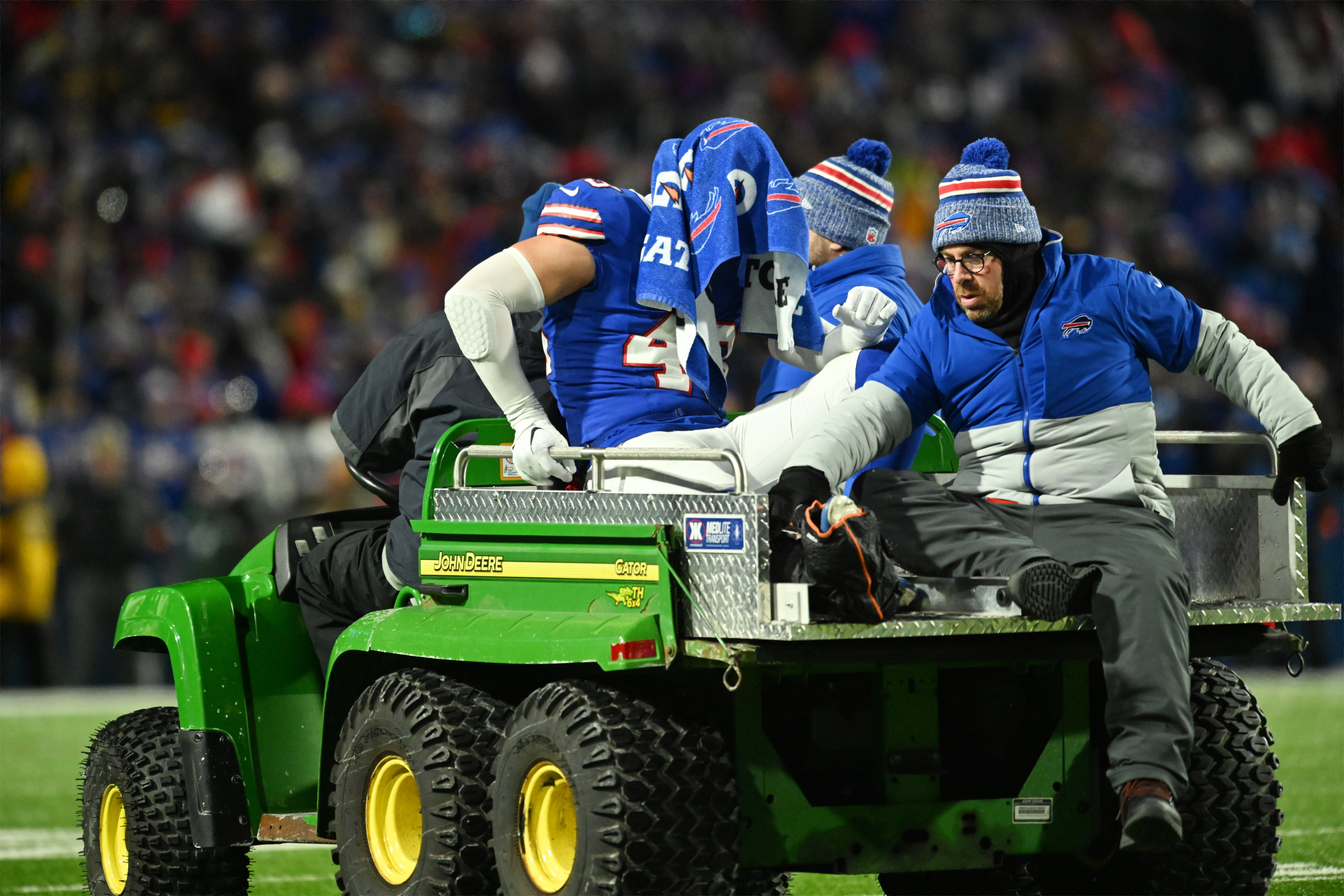 Buffalo Bills linebacker Terrel Bernard is carted off the field after an apparent injury against the Pittsburgh Steelers in a 2024 AFC wild card game at Highmark Stadium.