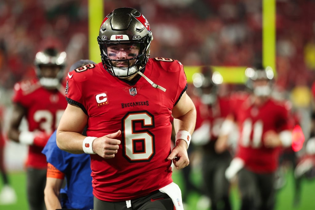 Tampa Bay Buccaneers quarterback Baker Mayfield (6) runs during warm ups before a 2024 NFC wild card game against the Philadelphia Eagles at Raymond James Stadium.