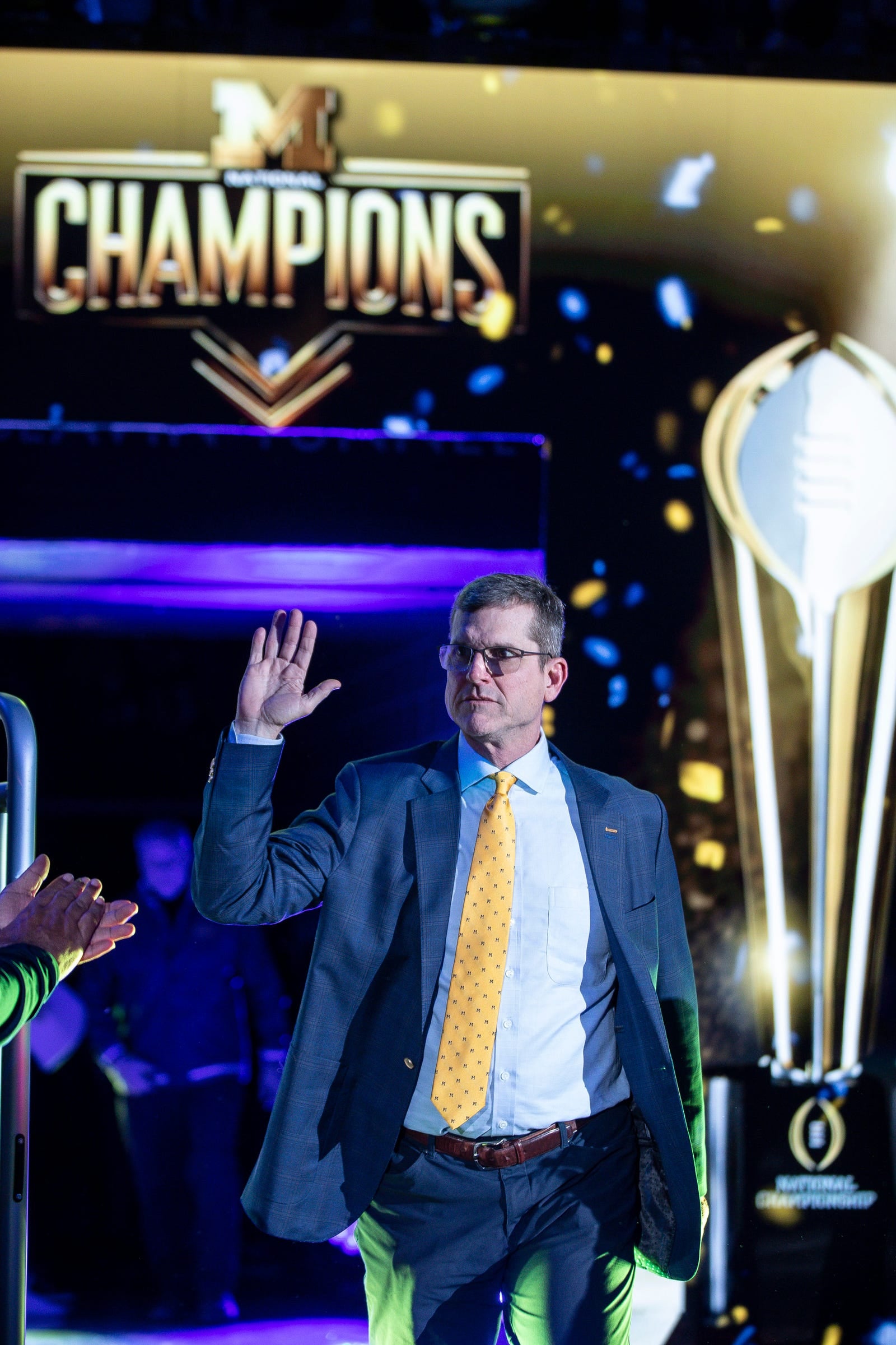 Michigan head coach Jim Harbaugh is introduced during the national championship celebration at Crisler Center in Ann Arbor