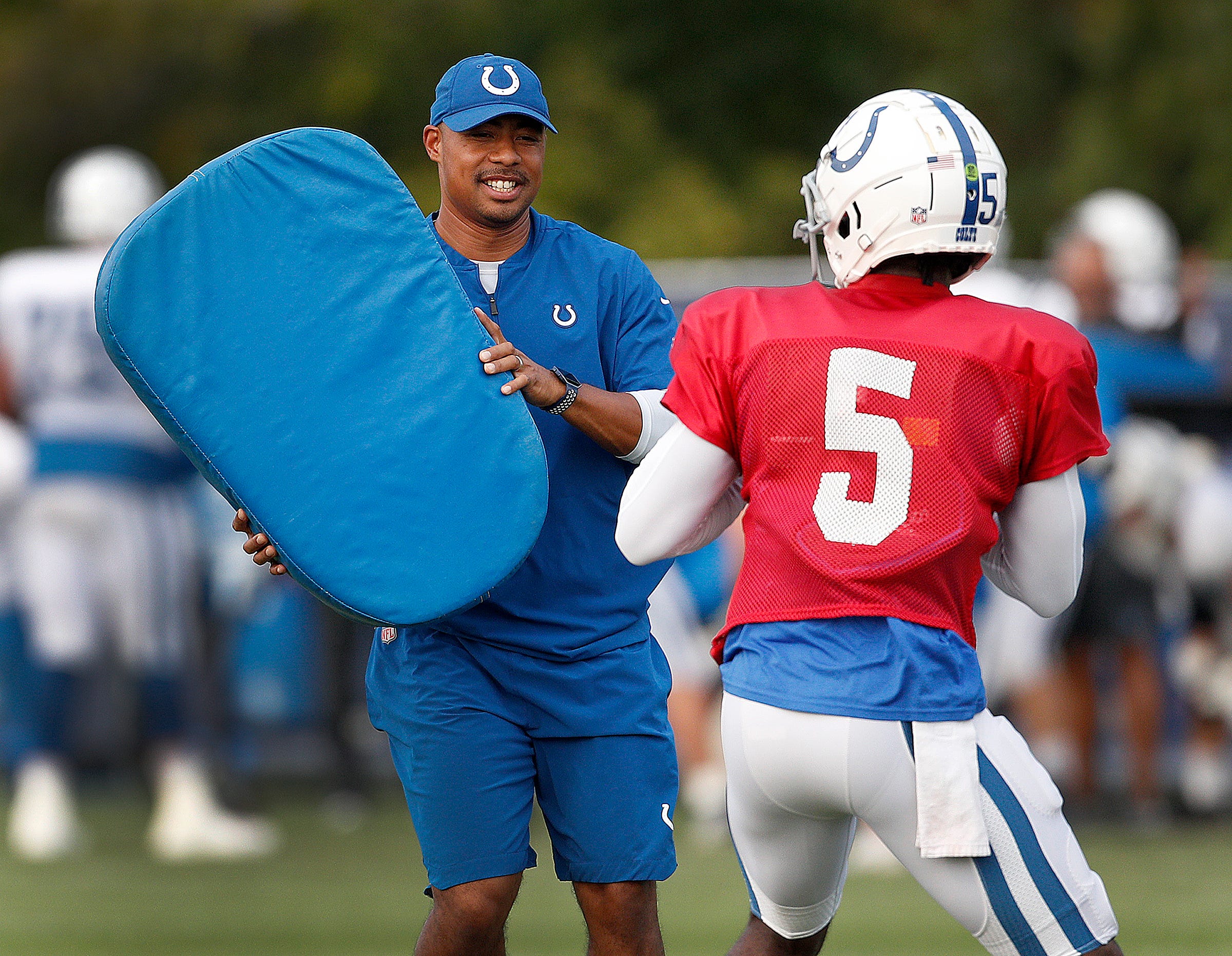 Then Indianapolis Colts assistant quarterbacks coach Marcus Brady works with his players at the Colts training camp at Grand Park in Westfield on Tuesday Aug 21 Indianapolis Colts Training Camp At Grand Park In Westfield