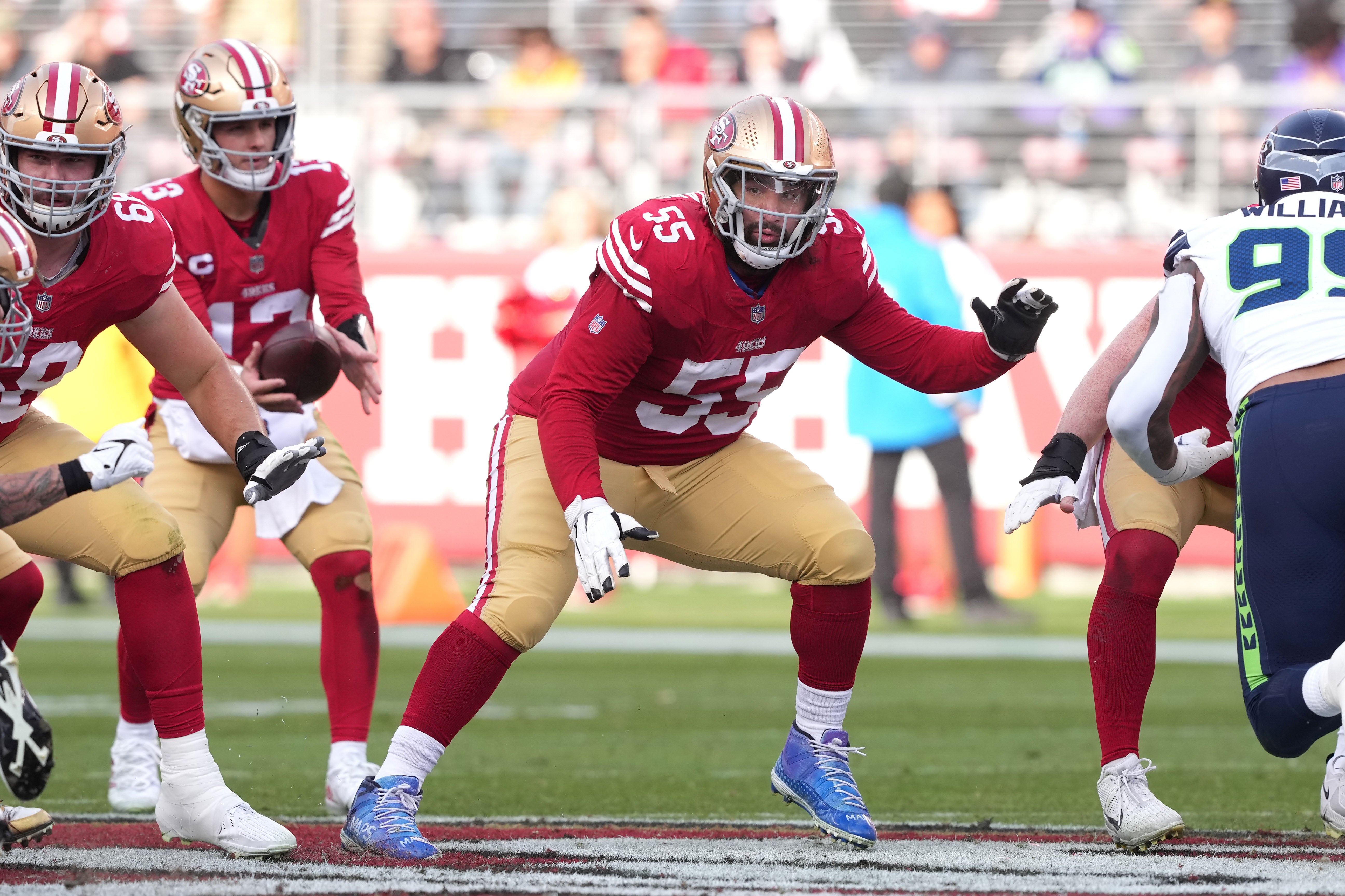 Dec 10, 2023; Santa Clara, California, USA; San Francisco 49ers guard Jon Feliciano (55) blocks against the Seattle Seahawks during the second quarter at Levi's Stadium.