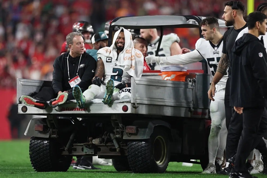 Philadelphia Eagles cornerback Darius Slay (2) is carted off the field after an injury against the Tampa Bay Buccaneers during the second half of a 2024 NFC wild card game at Raymond James Stadium.