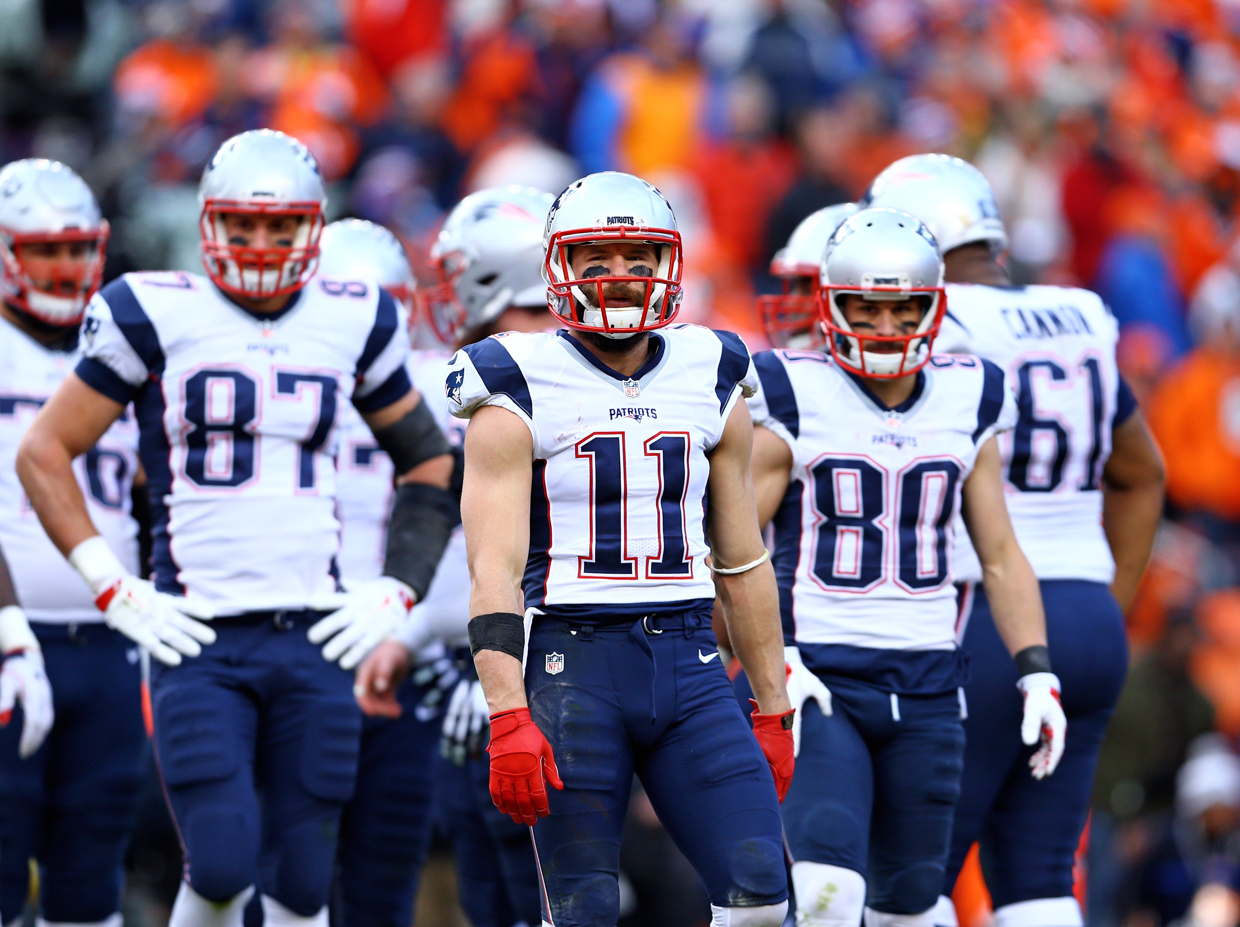 New England Patriots wide receiver Julian Edelman with wide receiver Danny Amendola and tight end Rob Gronkowski against the Denver Broncos in the AFC Championship football game at Sports Authority Field at Mile High