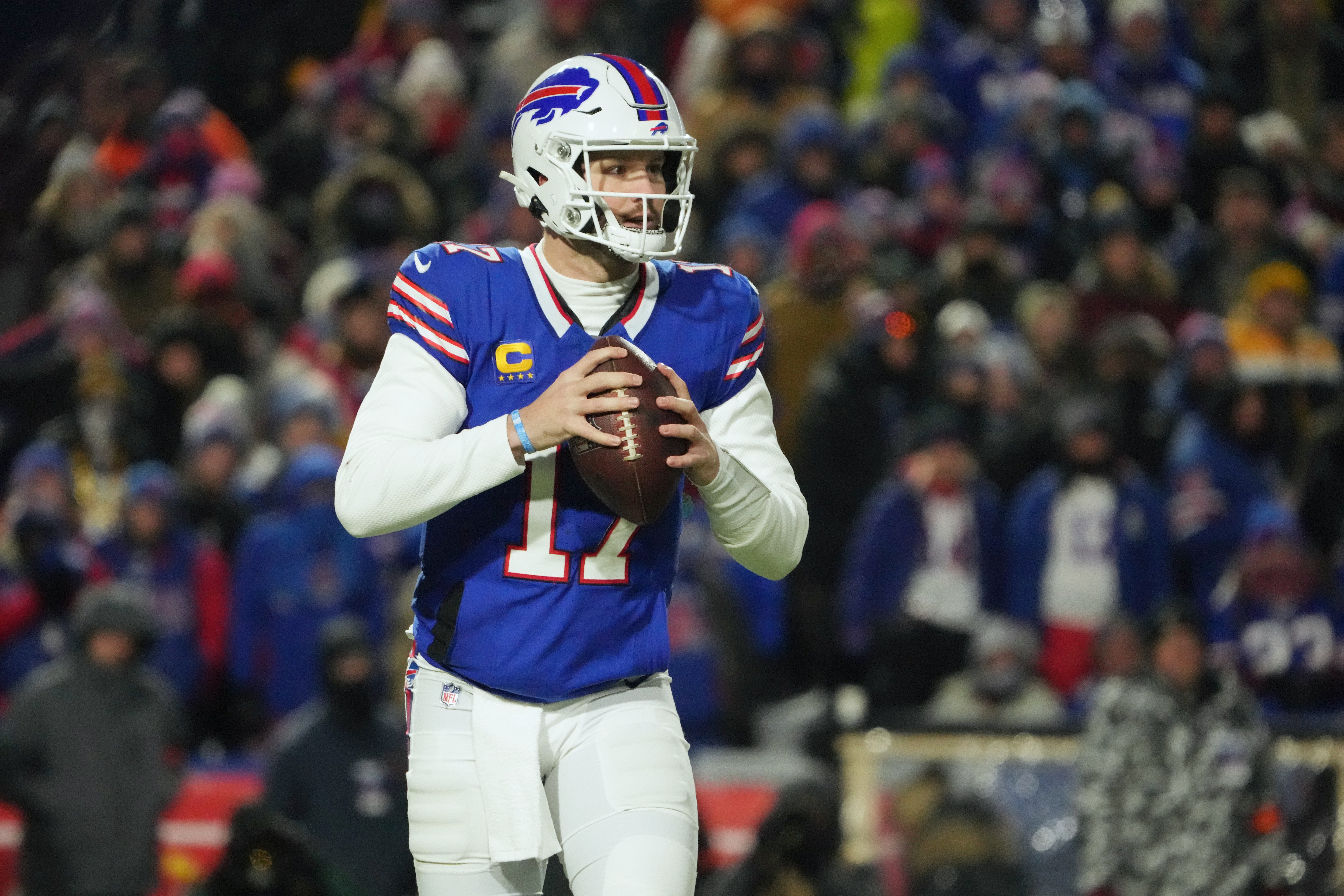 Buffalo Bills quarterback Josh Allen (17) looks to throw the ball in the first half against the Pittsburgh Steelers in a 2024 AFC wild card game at Highmark Stadium.