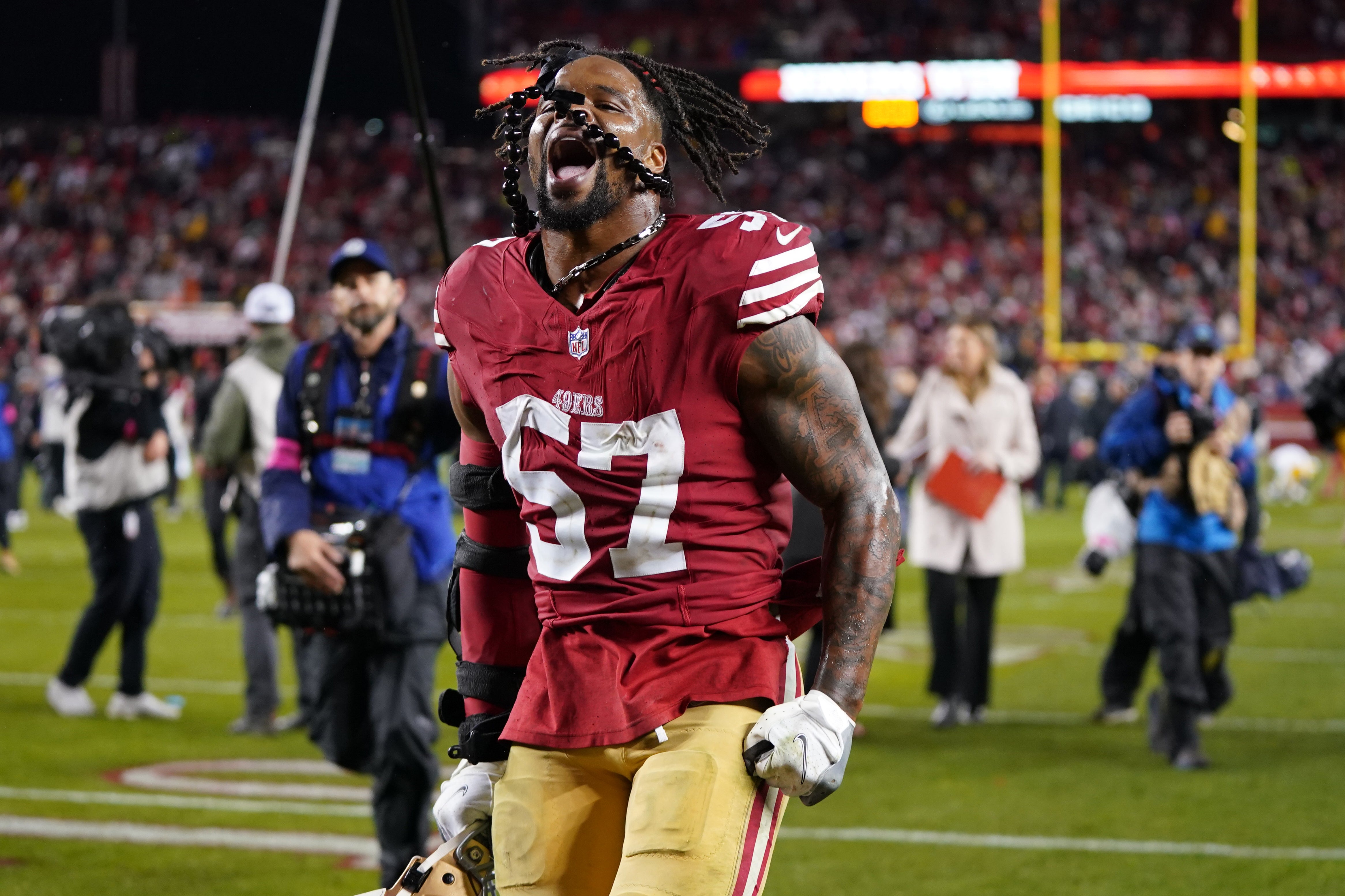 January 20, 2024; Santa Clara, CA, USA; San Francisco 49ers linebacker Dre Greenlaw (57) celebrates after defeating the Green Bay Packers in a 2024 NFC divisional round game at Levi's Stadium.