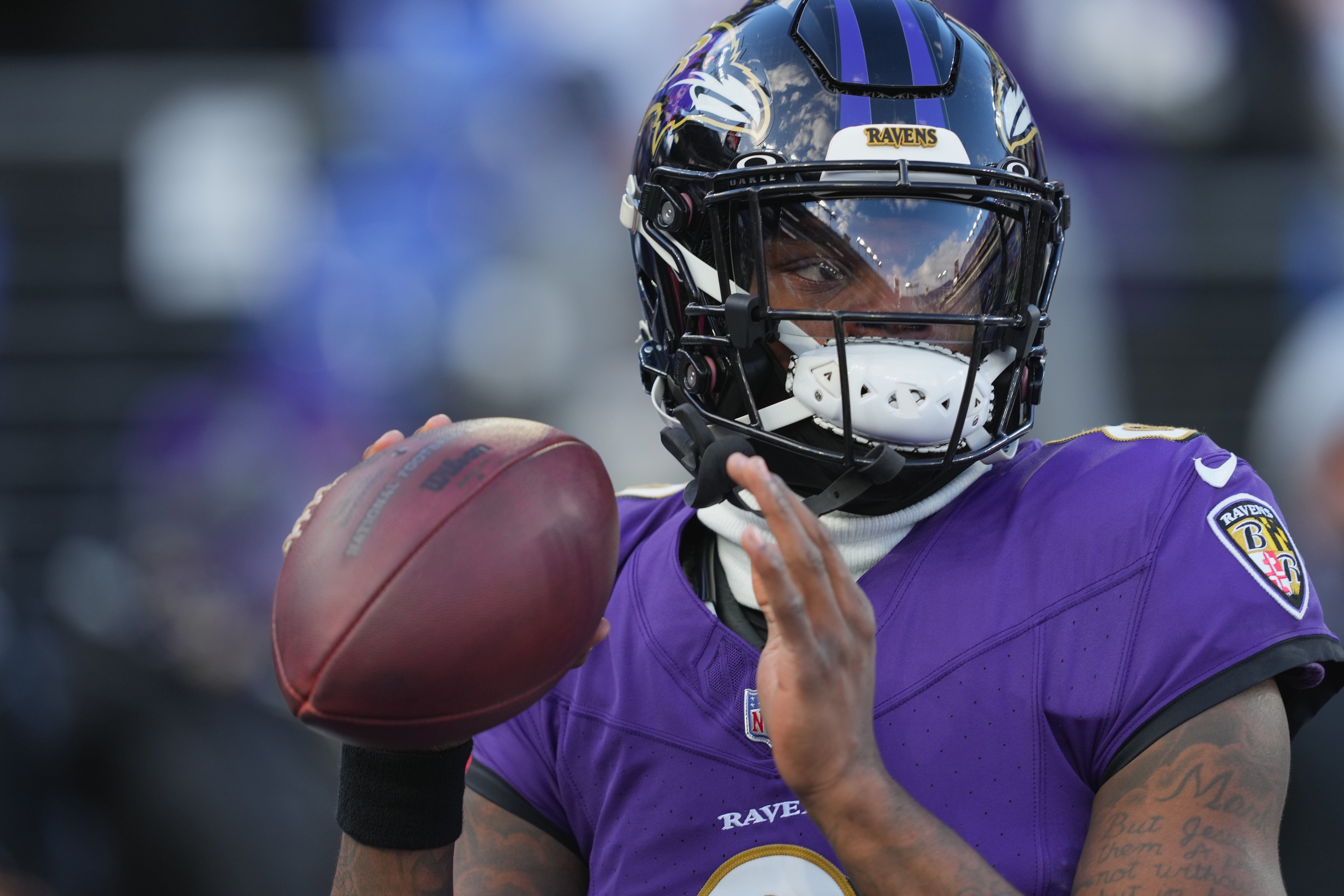 Jan 20, 2024; Baltimore, MD, USA; Baltimore Ravens quarterback Lamar Jackson (8) warms up before a 2024 AFC divisional round game against the Houston Texans at M&T Bank Stadium.