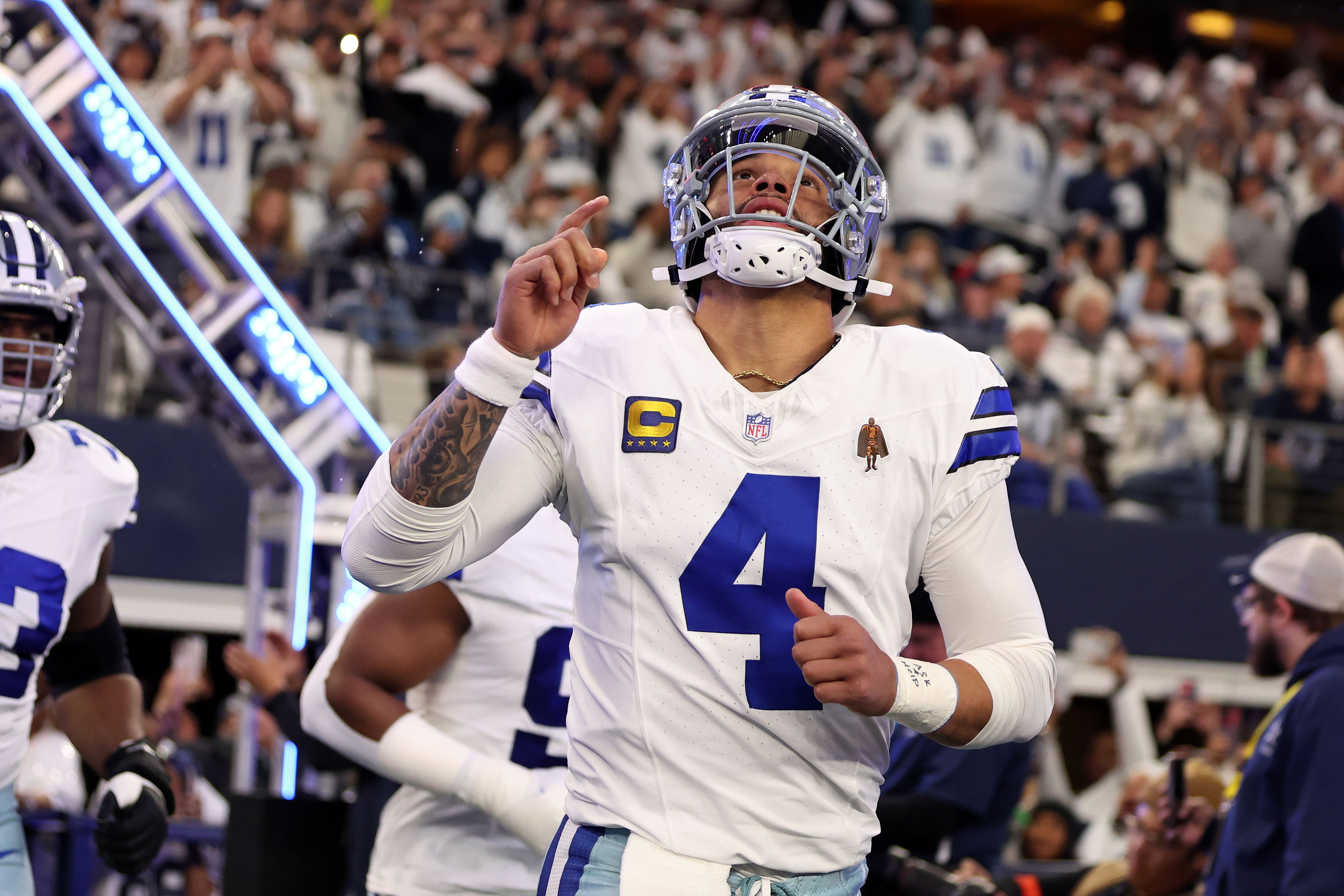 Dallas Cowboys quarterback Dak Prescott (4) takes the field against the Green Bay Packers for the 2024 NFC wild card game at AT&T Stadium.
