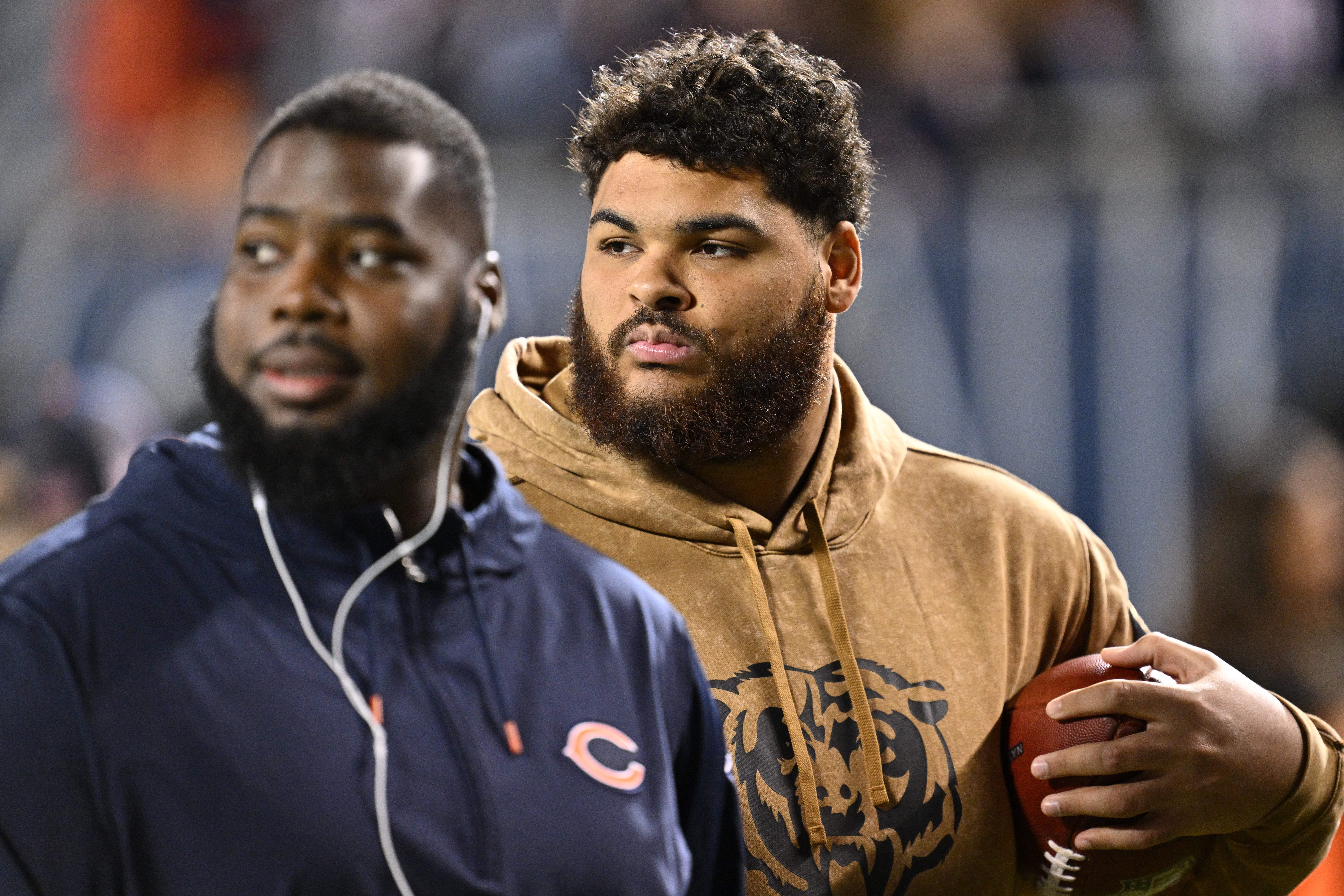 Nov 9, 2023; Chicago, Illinois, USA; Chicago Bears offensive lineman Darnell Wright (58) warms up on the field before a game against the Carolina Panthers at Soldier Field.