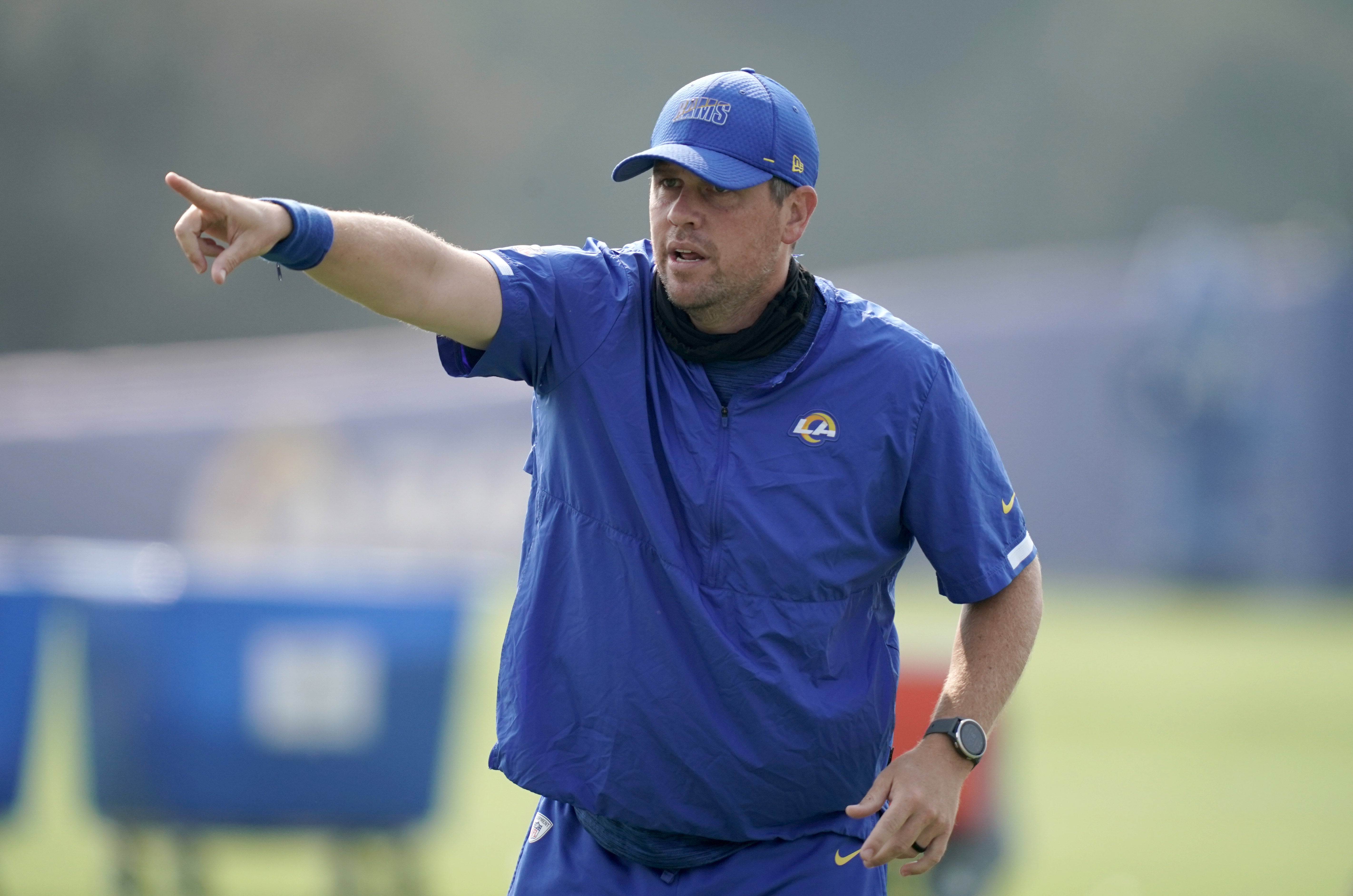 Aug 21, 2020; Thousand Oaks, CA, USA; Los Angeles Rams pass game coordinator Shane Waldron gestures during training camp at Cal Lutheran University.