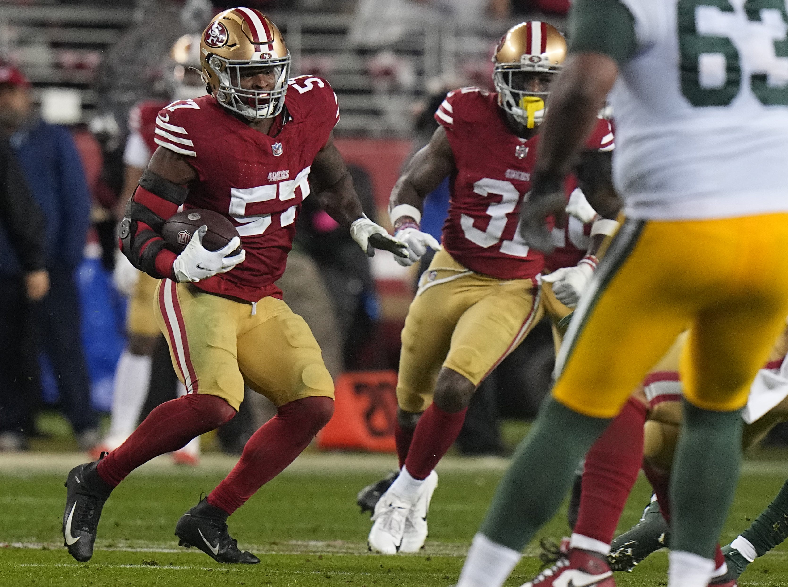 San Francisco 49ers linebacker Dre Greenlaw (57) intercepts a pass during the third quarter of their NFC divisional playoff game Saturday, January 20, 2024 at Levi Stadium in Santa Clara, California. The San Francisco 49ers beat the Green Bay Packers 24-21.