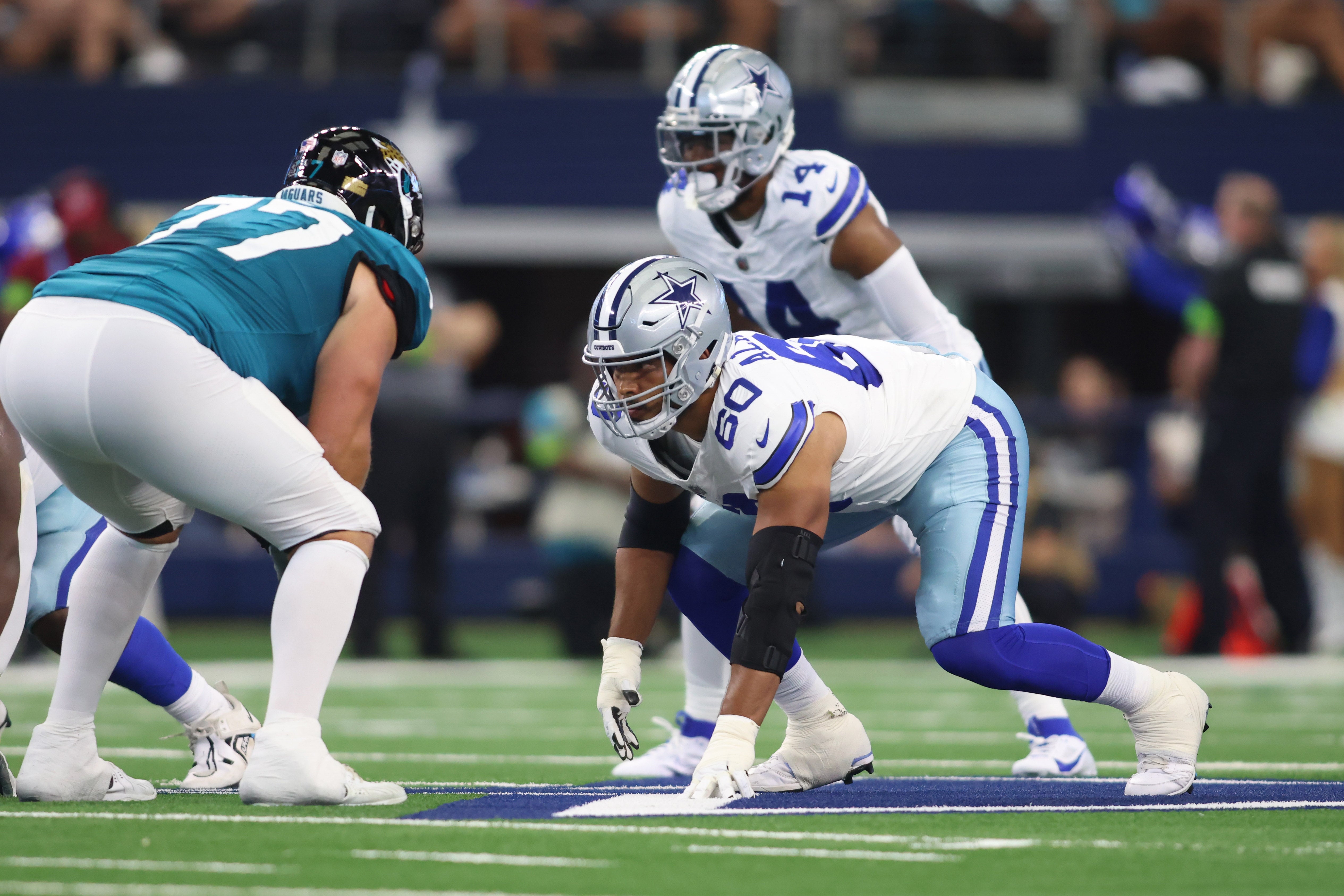 Dallas Cowboys offensive tackle Isaac Alarcon (60) on the line of scrimmage in the game against the Jacksonville Jaguars at AT&T Stadium.