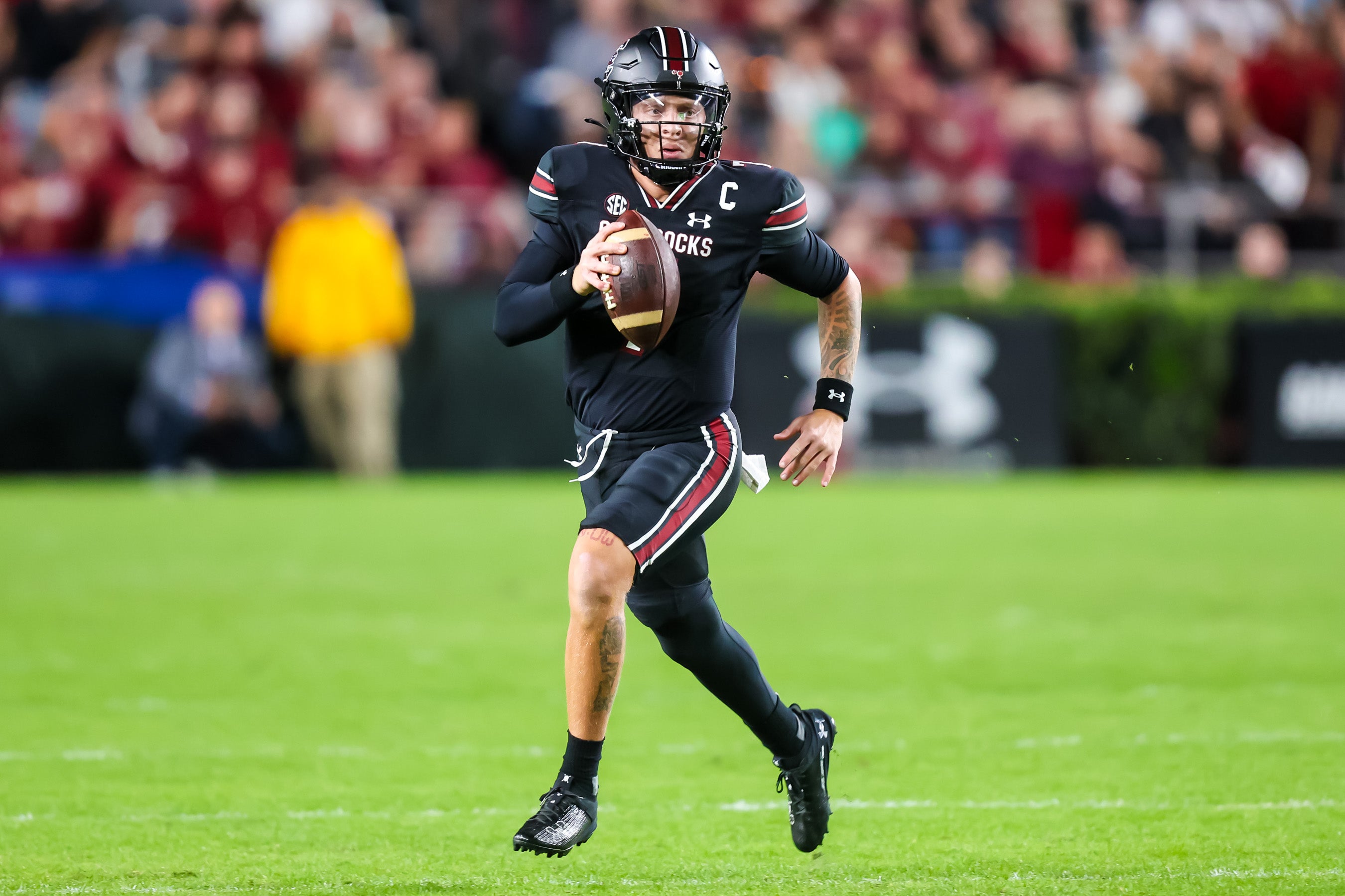 Nov 18, 2023; Columbia, South Carolina, USA; South Carolina Gamecocks quarterback Spencer Rattler (7) scrambles against the Kentucky Wildcats in the first quarter at Williams-Brice Stadium.