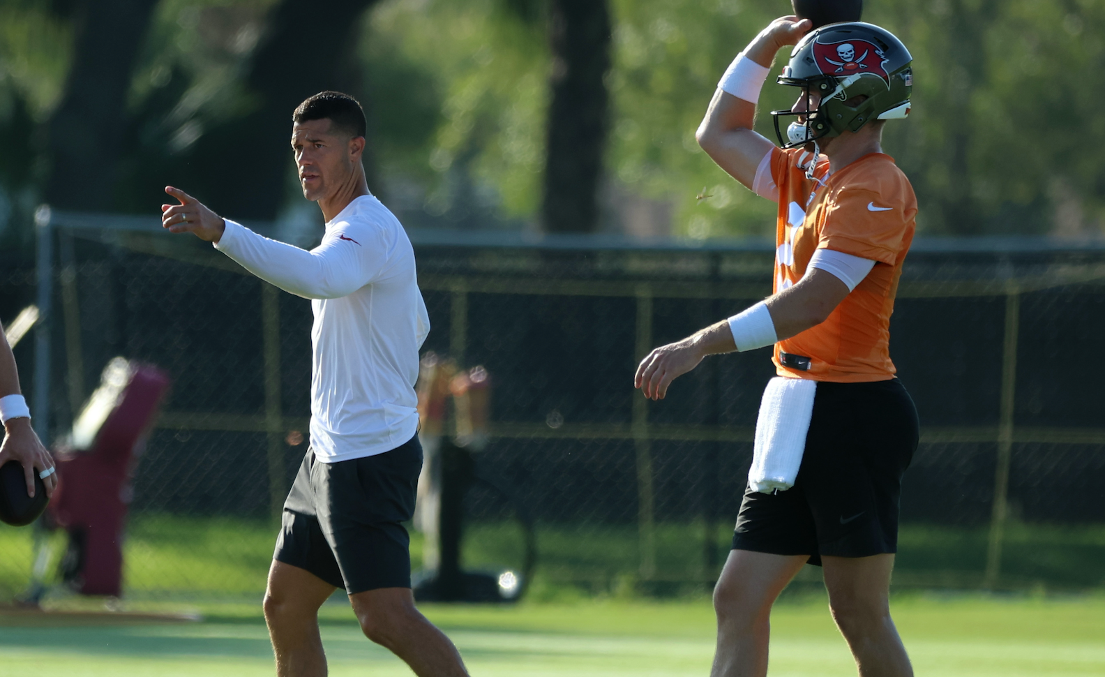 Jul 30, 2023; Tampa, FL, USA; Tampa Bay Buccaneers offensive coordinator Dave Canales talks with quarterback Baker Mayfield (6) and quarterback Kyle Trask (2) during training camp at AdventHealth Training Center. Mandatory Credit: Kim Klement-USA TODAY Sports