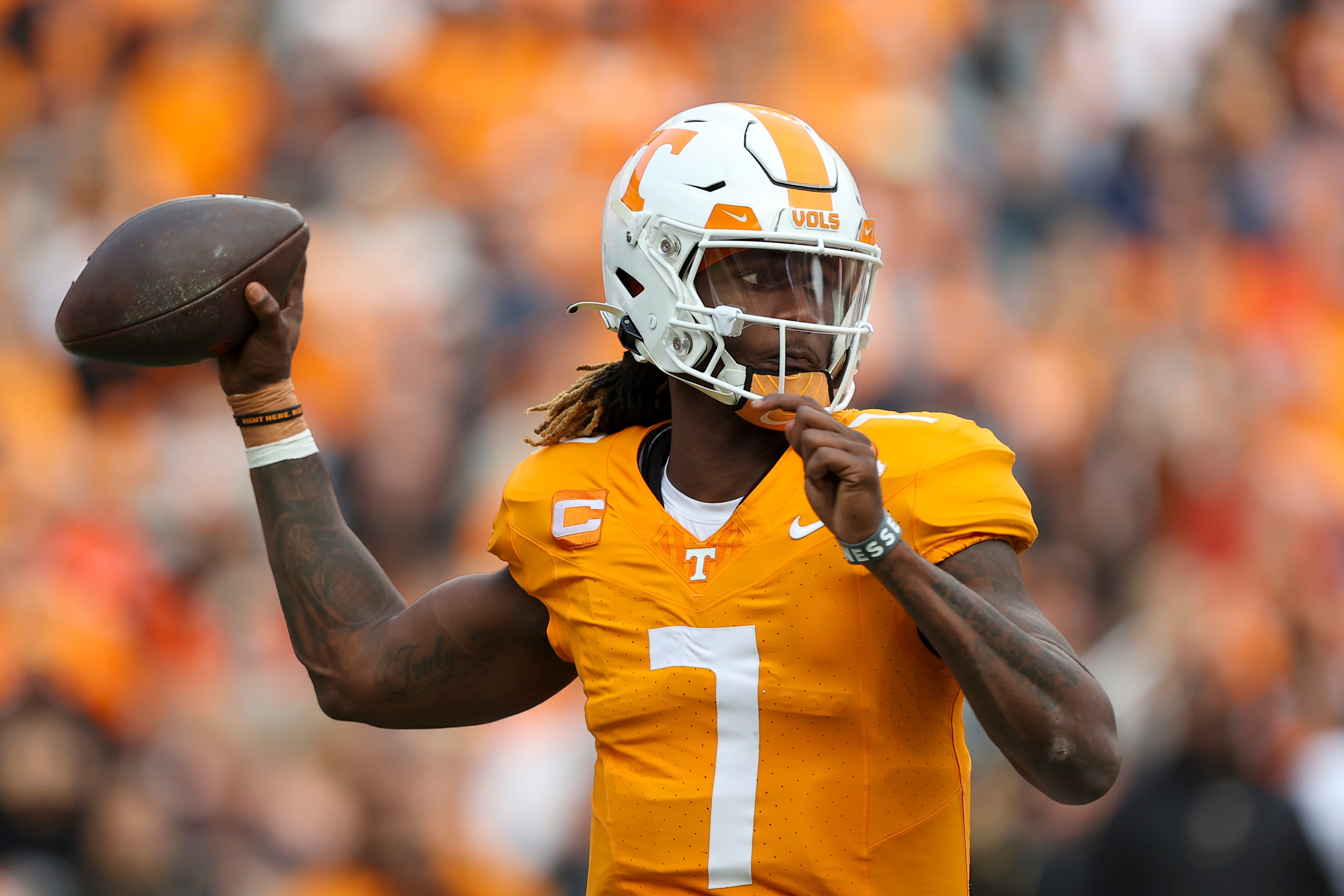 Nov 25, 2023; Knoxville, Tennessee, USA; Tennessee Volunteers quarterback Joe Milton III (7) passes the ball against the Vanderbilt Commodores during the first half at Neyland Stadium.
