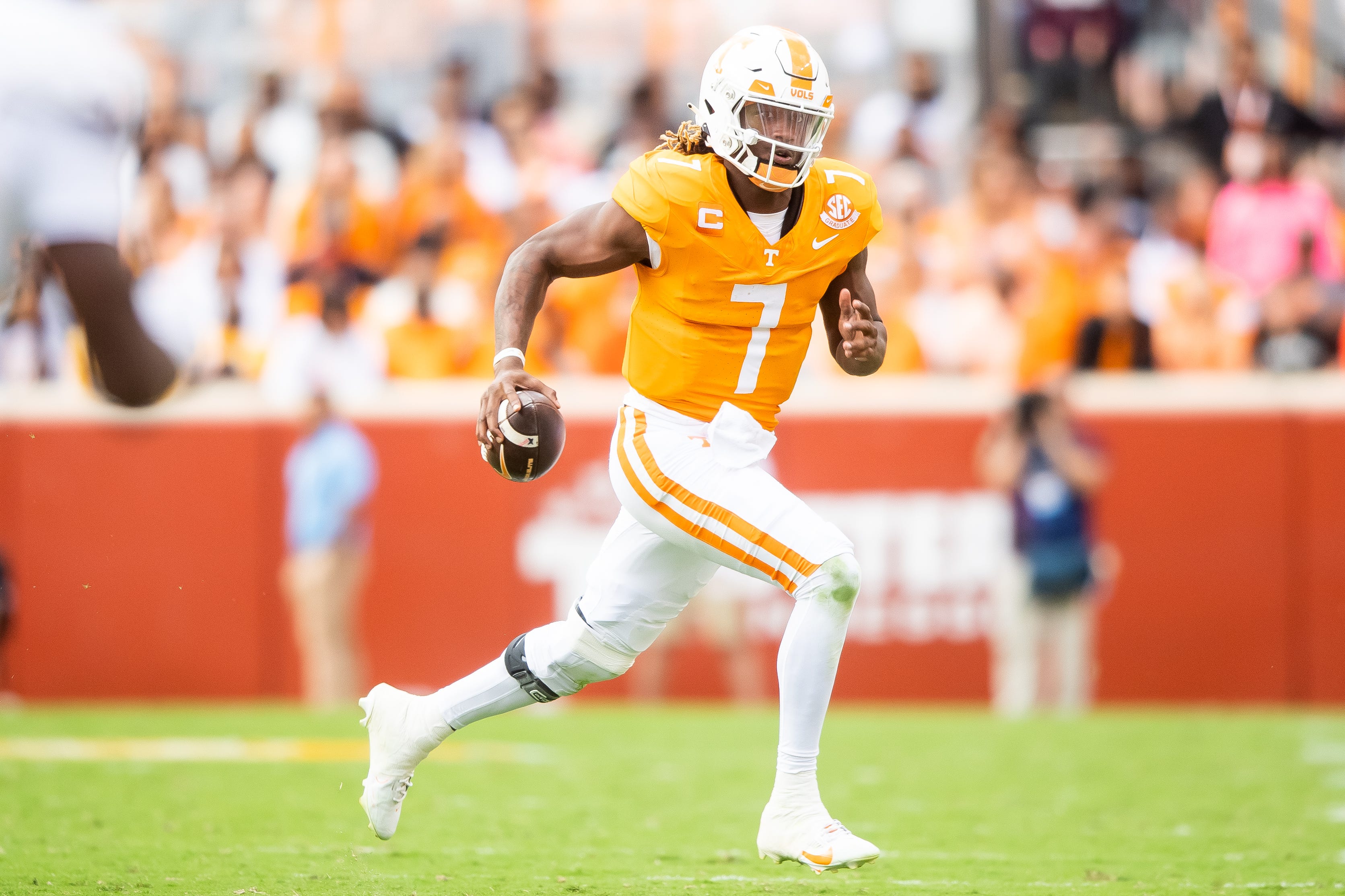 Tennessee quarterback Joe Milton III (7) runs with the ball during a football game between Tennessee and Texas A&M at Neyland Stadium in Knoxville, Tenn., on Saturday, Oct. 14, 2023.