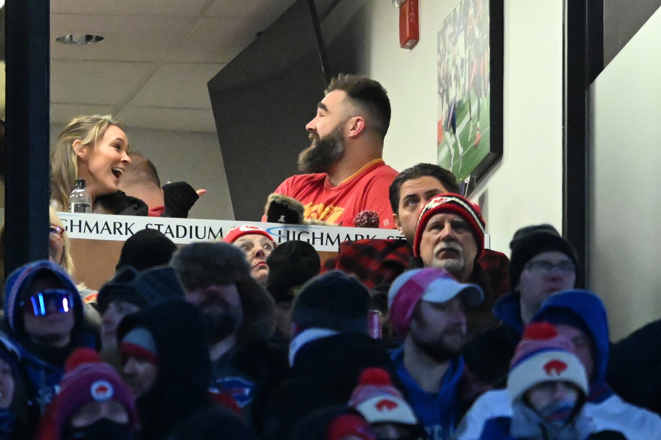 Jason Kelce and Kylie Kelce watch the game from the suites in the first half of the 2024 AFC divisional round game between the Buffalo Bills and the Kansas City Chiefs at Highmark Stadium
