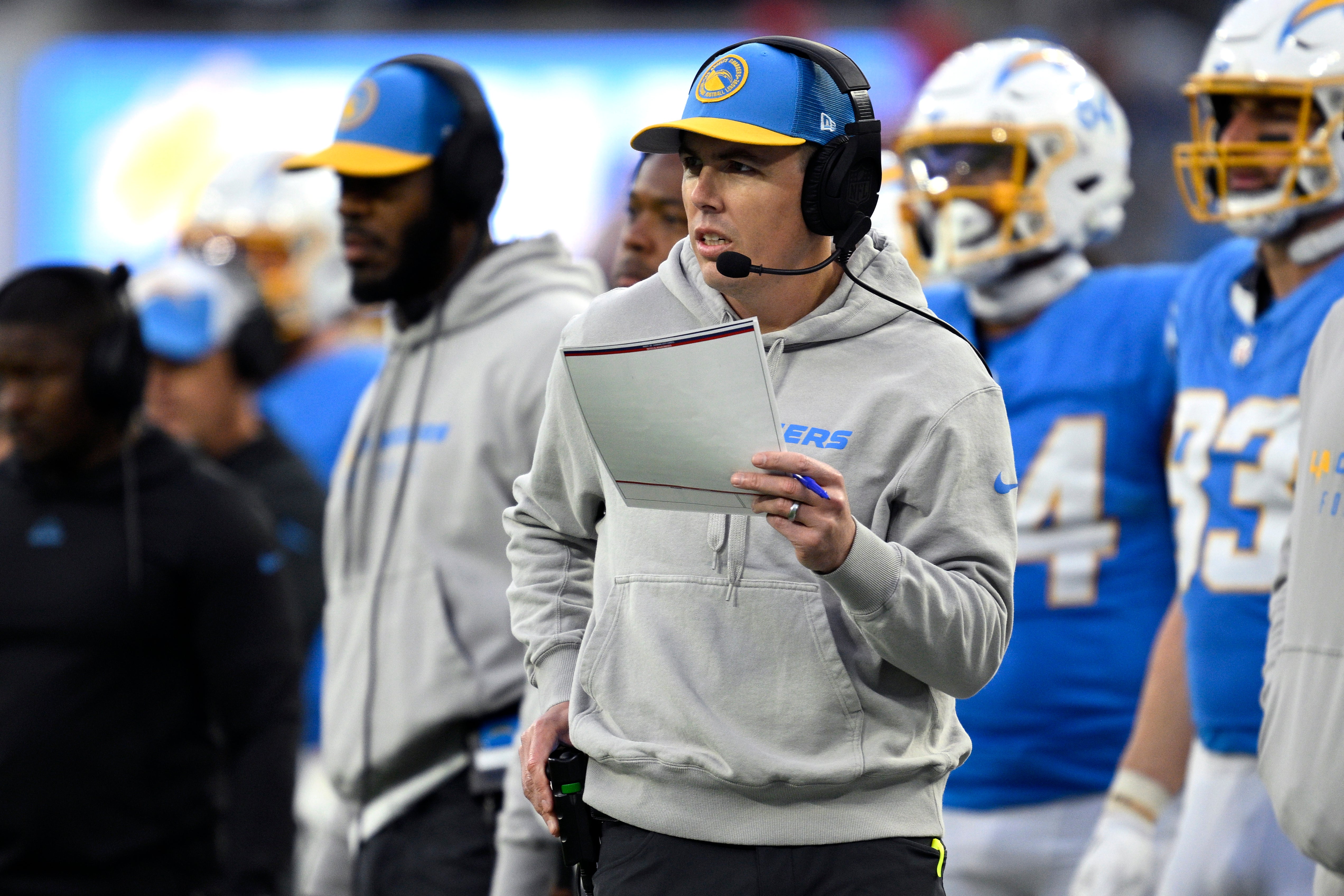 Los Angeles Chargers offensive coordinator Kellen Moore looks on during the second half against the Kansas City Chiefs at SoFi Stadium.