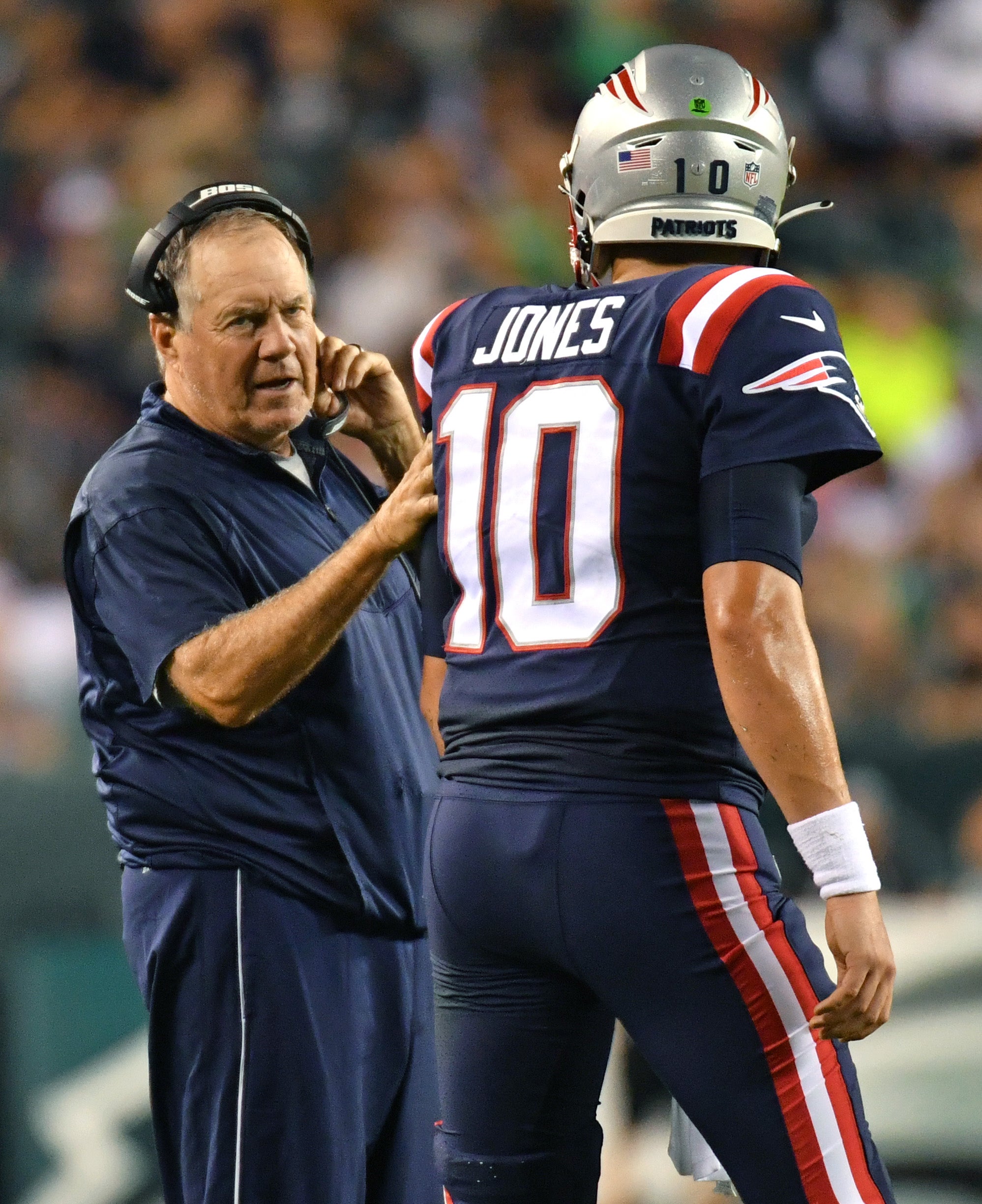 New England Patriots head coach Bill Belichick with quarterback Mac Jones against the Philadelphia Eagles at Lincoln Financial Field.