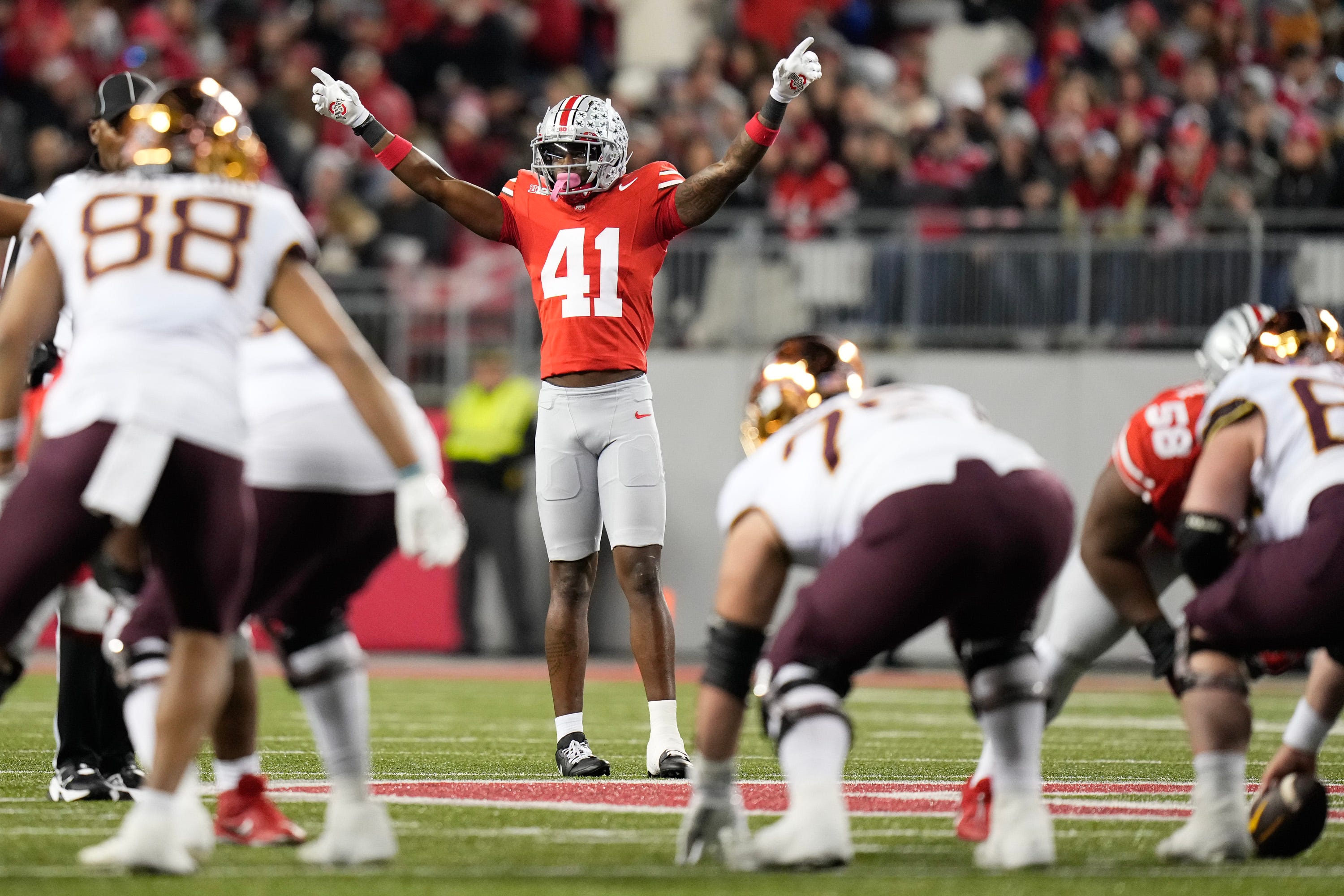 Nov 18, 2023; Columbus, Ohio, USA; Ohio State Buckeyes safety Josh Proctor (41) signals a play to the defense during the second half of the NCAA football game against the Minnesota Golden Gophers at Ohio Stadium. Ohio State won 37-3.  