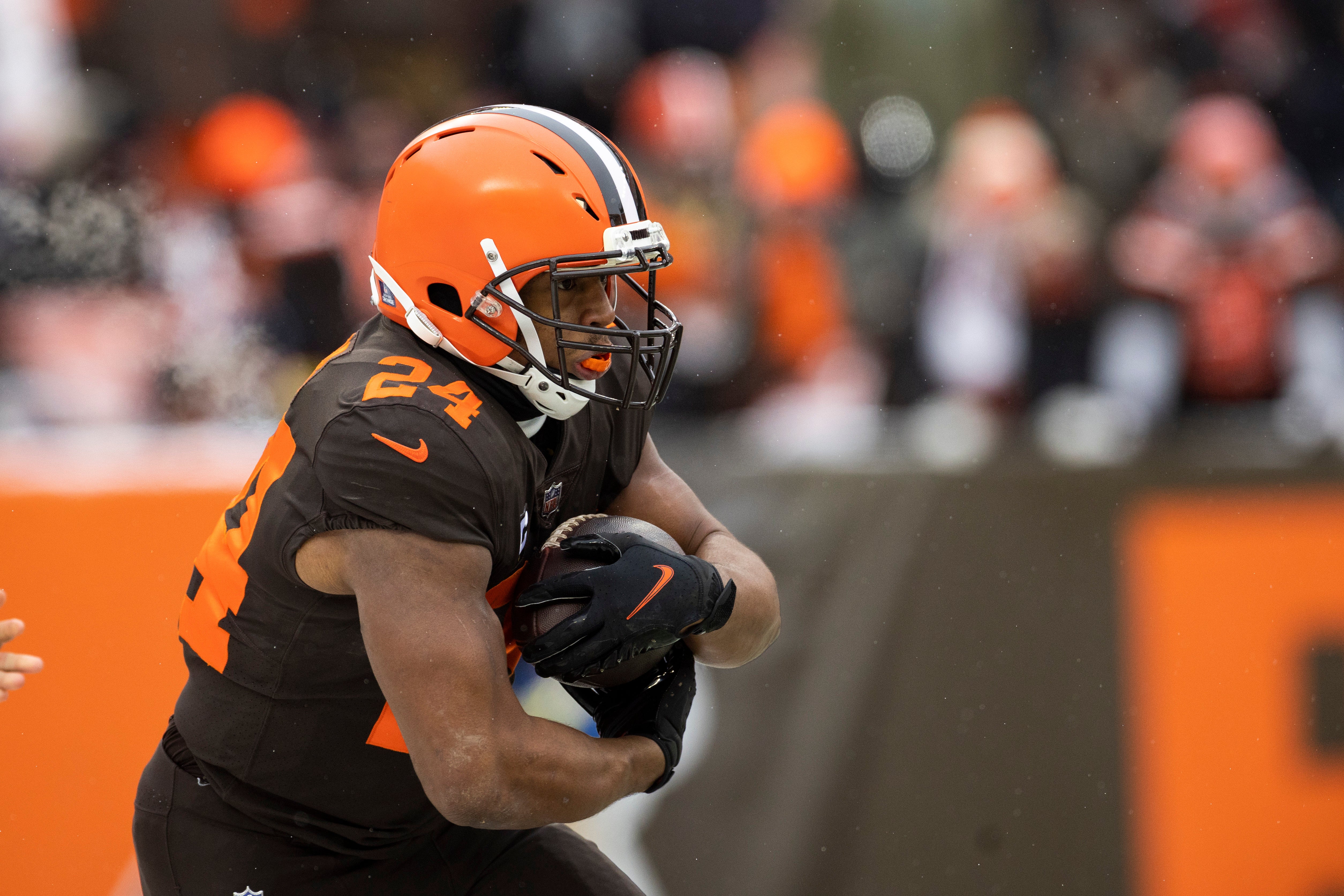 Dec 24, 2022; Cleveland, Ohio, USA; Cleveland Browns running back Nick Chubb (24) runs the ball against the New Orleans Saints during the first quarter at FirstEnergy Stadium. Mandatory Credit: Scott Galvin-USA TODAY Sports