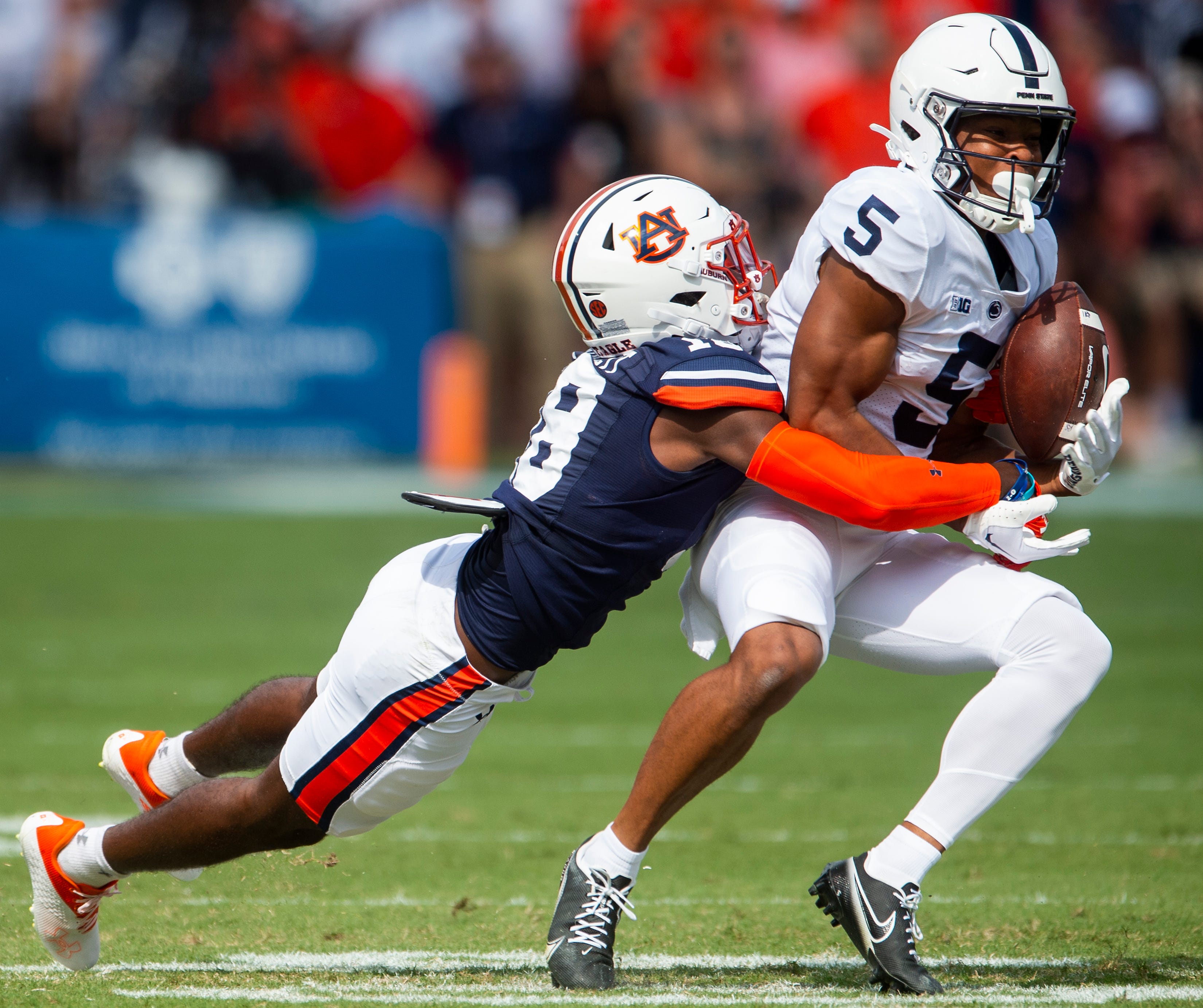 Auburn Tigers defensive back Nehemiah Pritchett (18) defends against Penn State Nittany Lions wide receiver Mitchell Tinsley (5) as Auburn Tigers take on Penn State Nittany Lions at Jordan-Hare Stadium in Auburn, Ala., on Saturday, Sept. 17, 2022. Aupsu05