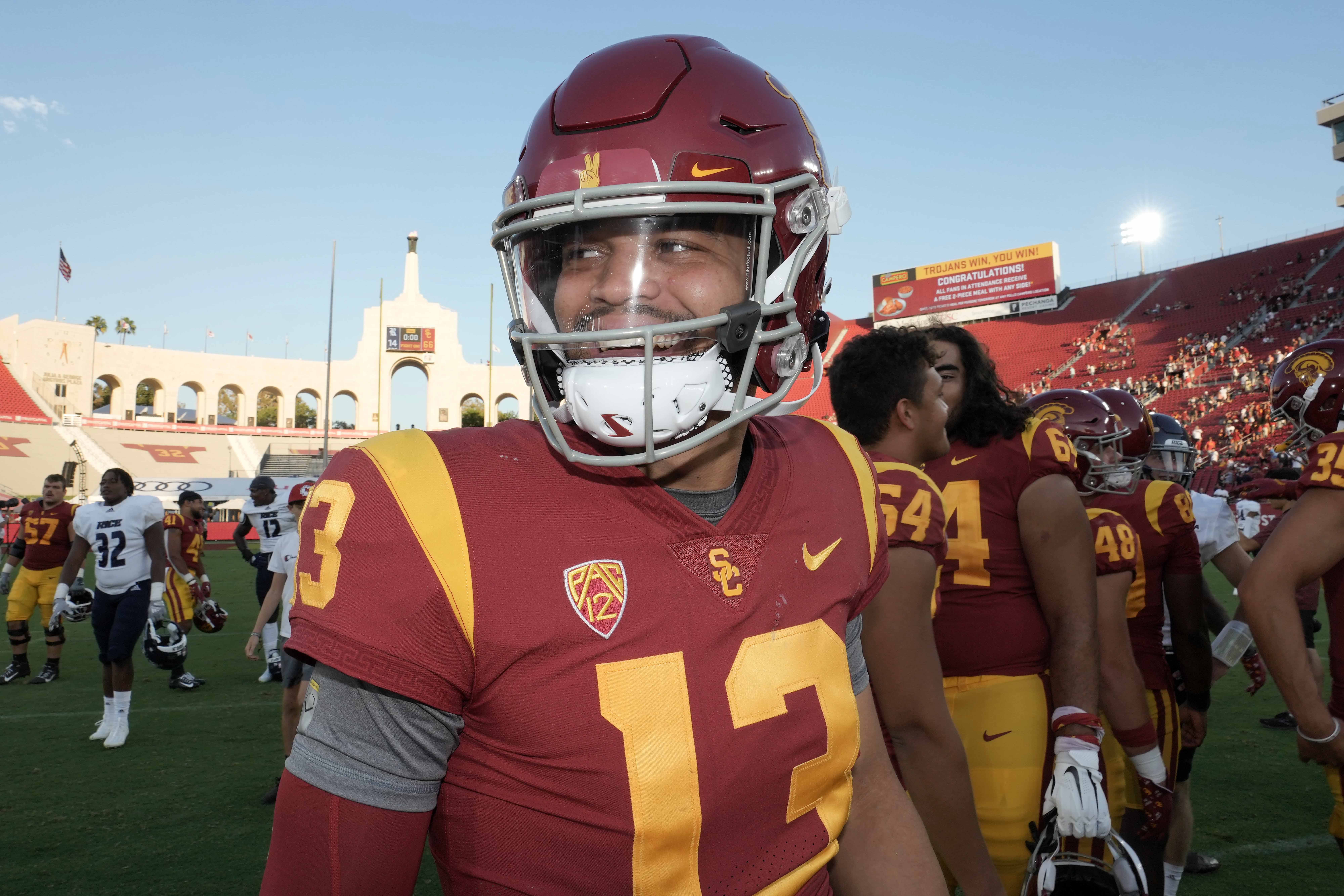 Sep 3, 2022; Los Angeles, California, USA; Southern California Trojans quarterback Caleb Williams (13) celebrates after the game against the Rice Owls at United Airlines Field at Los Angeles Memorial Coliseum.