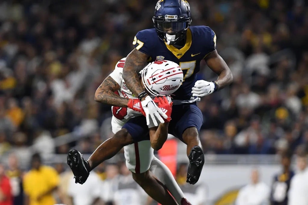 Toledo Rockets cornerback Quinyon Mitchell (27) breaks up a pass intended for Miami (OH) Redhawks wide receiver Gage Larvadain (10) in the third quarter at Ford Field.