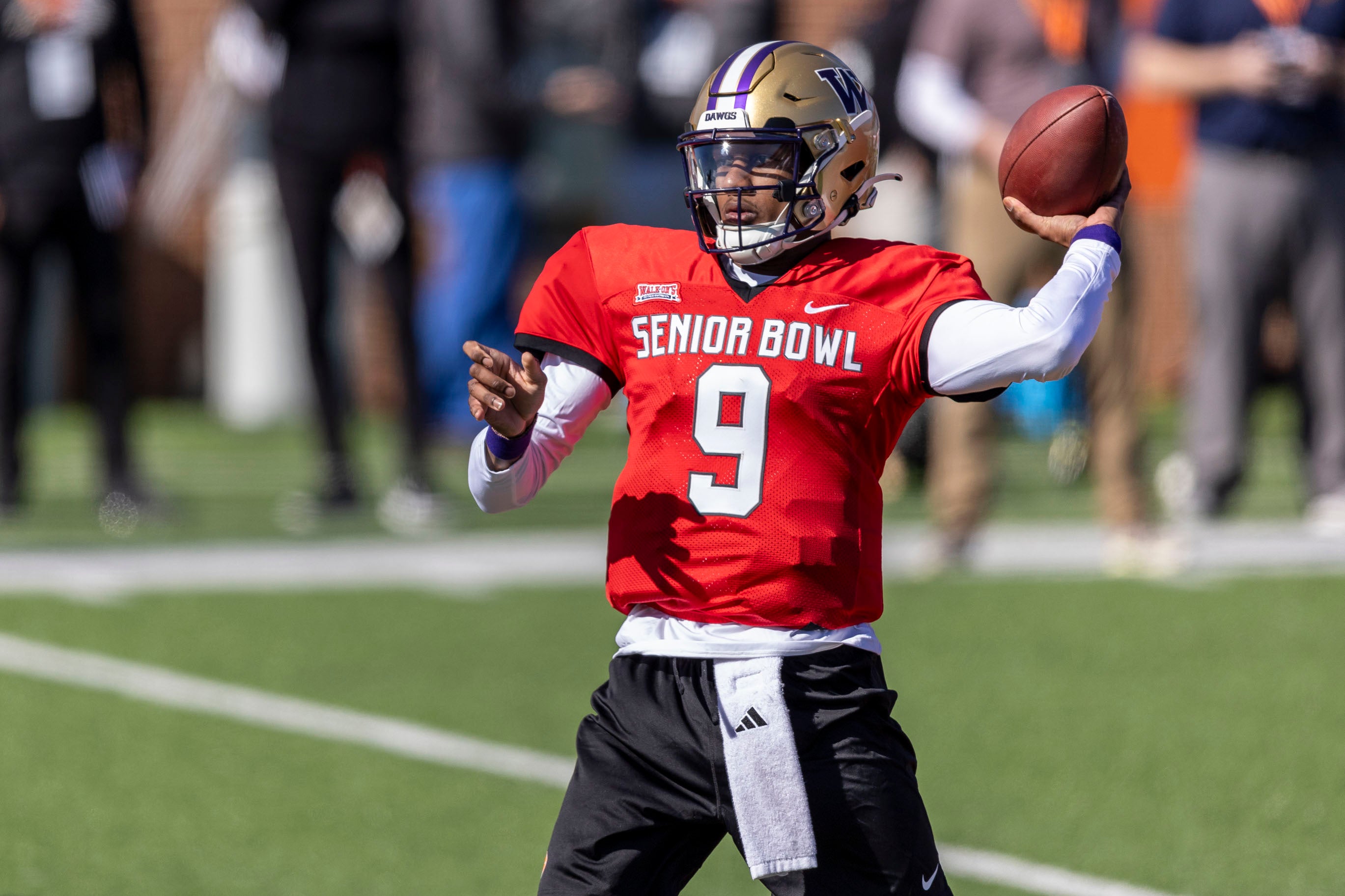 Jan 30, 2024; Mobile, AL, USA; National quarterback Michael Penix Jr. of Washington (9) throws the ball during practice for the National team at Hancock Whitney Stadium.