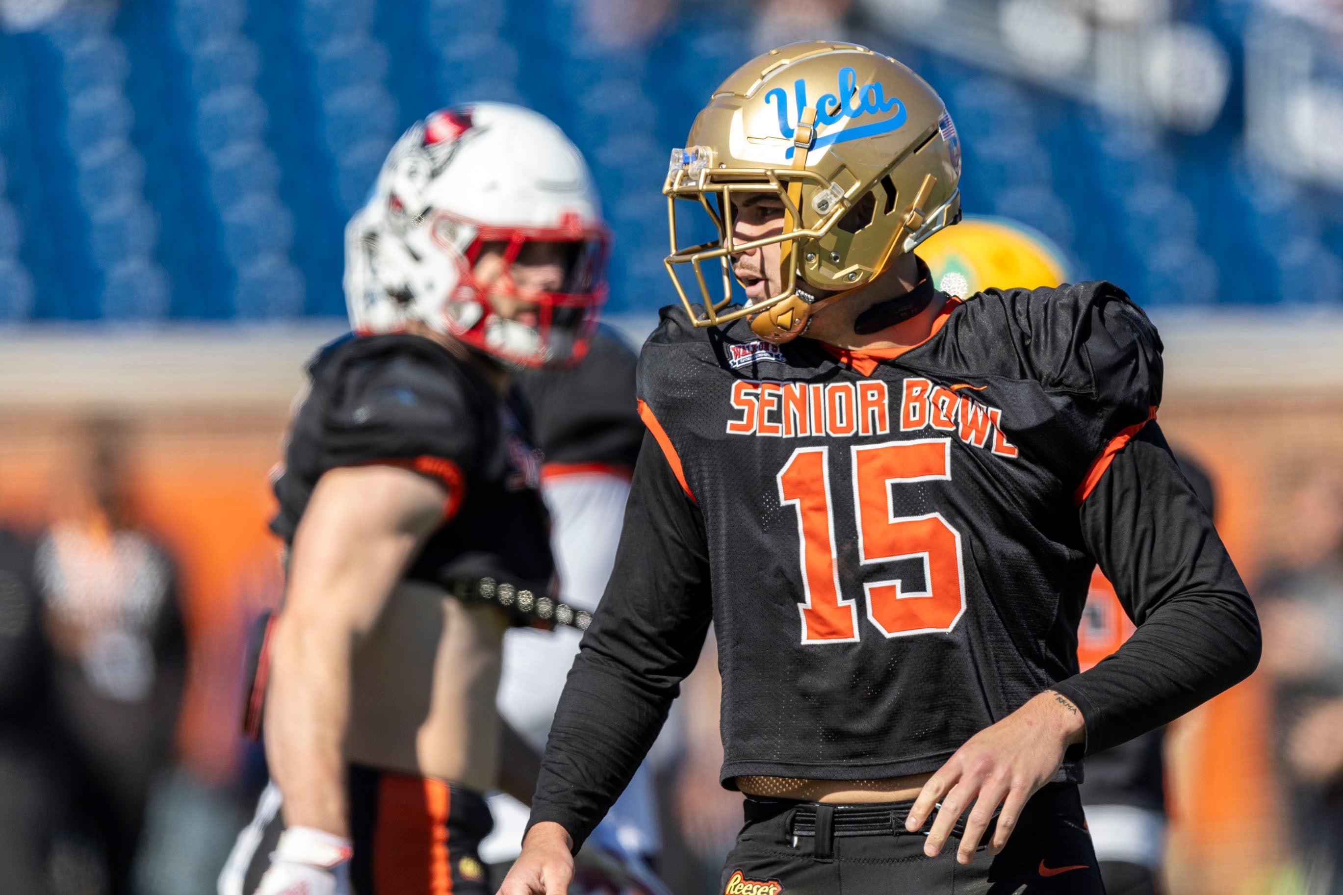 Jan 31, 2024; Mobile, AL, USA; National edge Laiatu Latu of UCLA (15) breaks the defensive huddle during practice for the National team at Hancock Whitney Stadium.