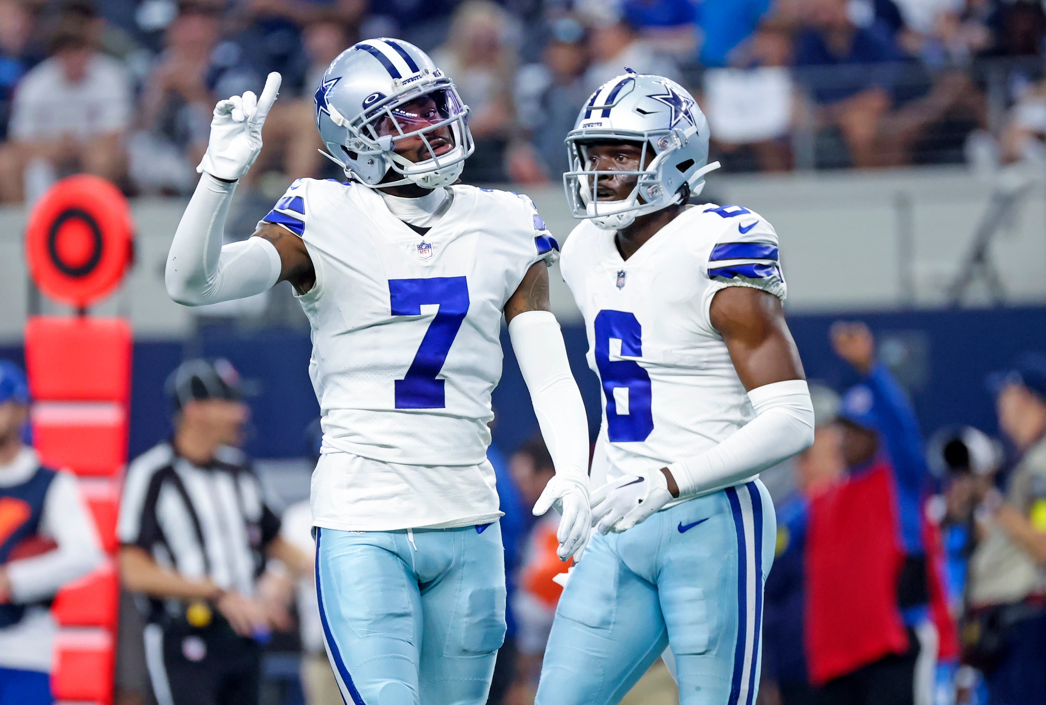 Dallas Cowboys cornerback Trevon Diggs (7) celebrates with safety Donovan Wilson (6) during the first half against the Detroit Lions at AT&T Stadium.
