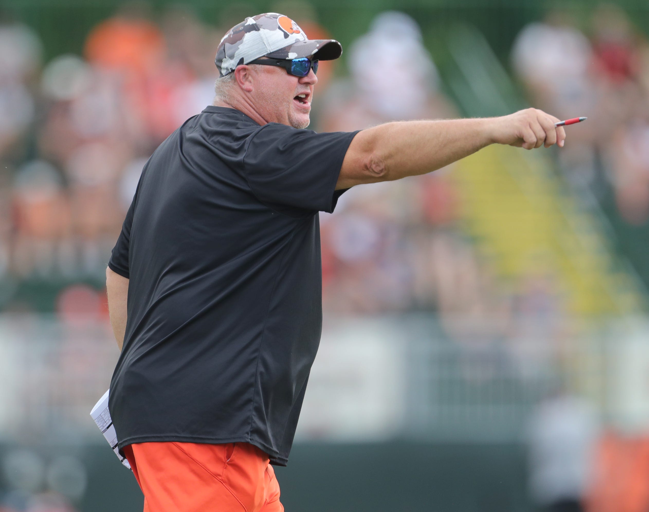Browns offensive coordinator Alex Van Pelt directs the offense during training camp