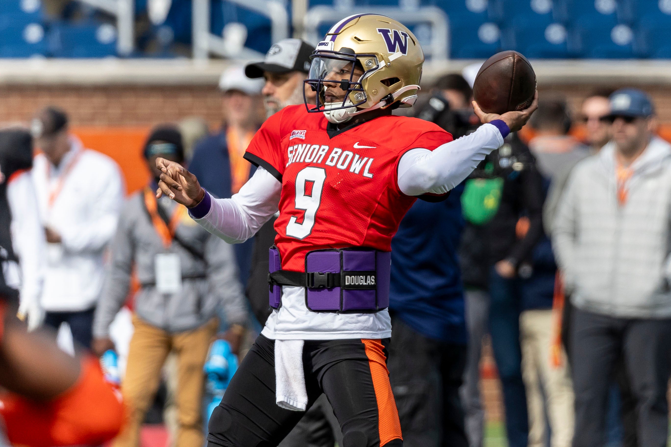 Feb 1, 2024; Mobile, AL, USA; National quarterback Michael Penix Jr of Washington (9) throws the ball during practice for the National team at Hancock Whitney Stadium.