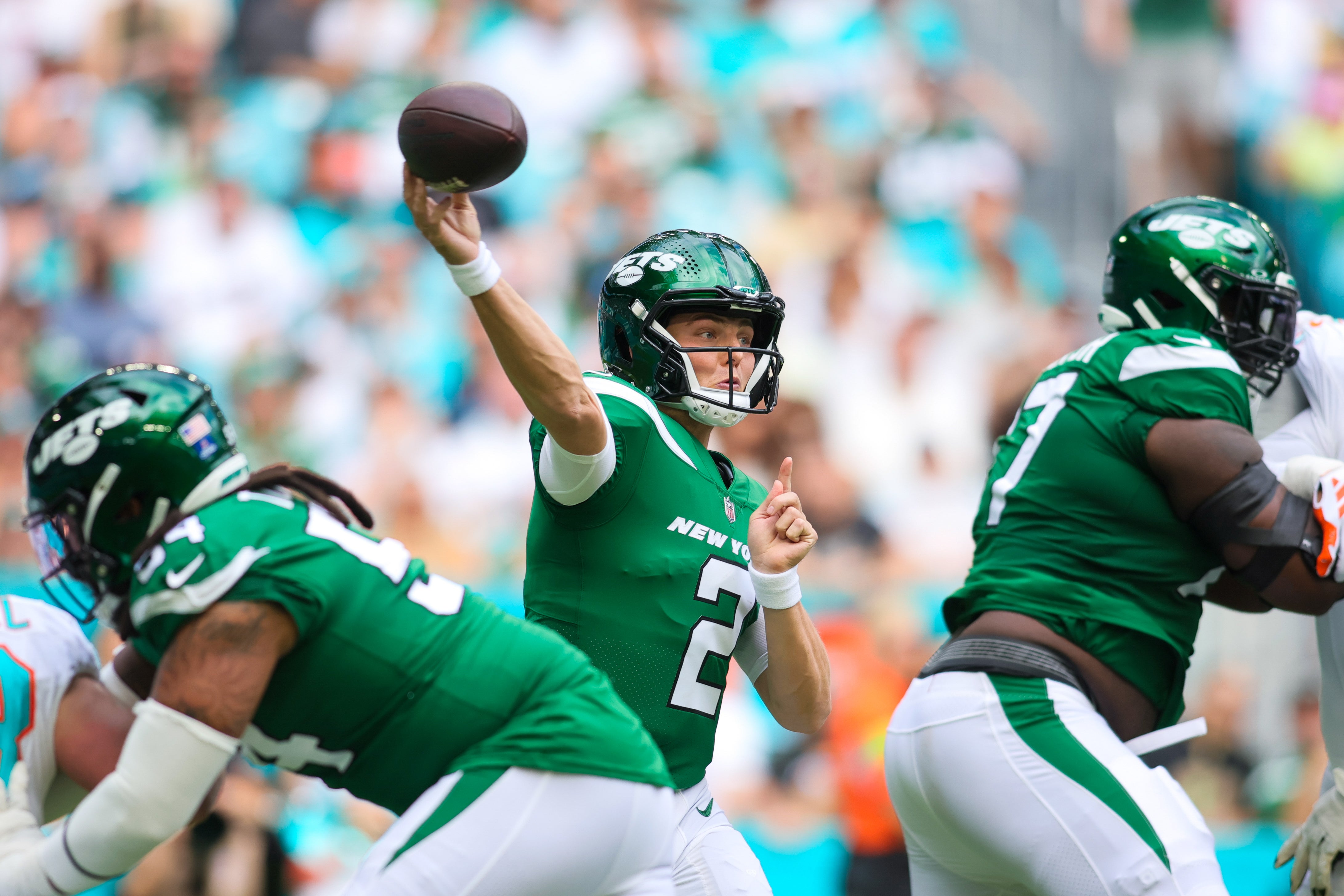 New York Jets quarterback Zach Wilson (2) throws the football against the Miami Dolphins during the first quarter at Hard Rock Stadium.
