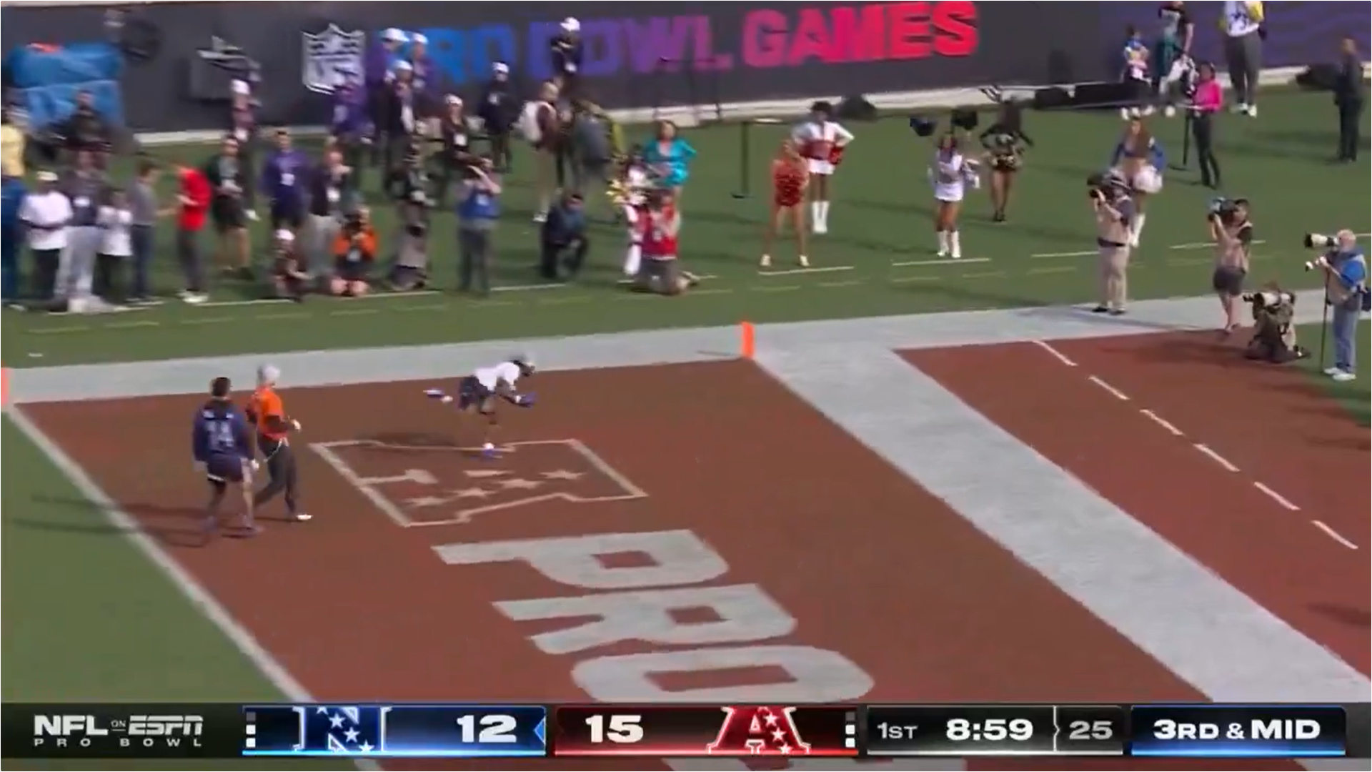 Dallas Cowboys WR CeeDee Lamb scores on a pass from Jalen Hurts in the 2024 Pro Bowl Games.