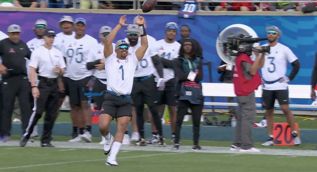 Jalen Hurts and CeeDee Lamb attempt the "Philly Special" during the 2024 Pro Bowl flag football game.